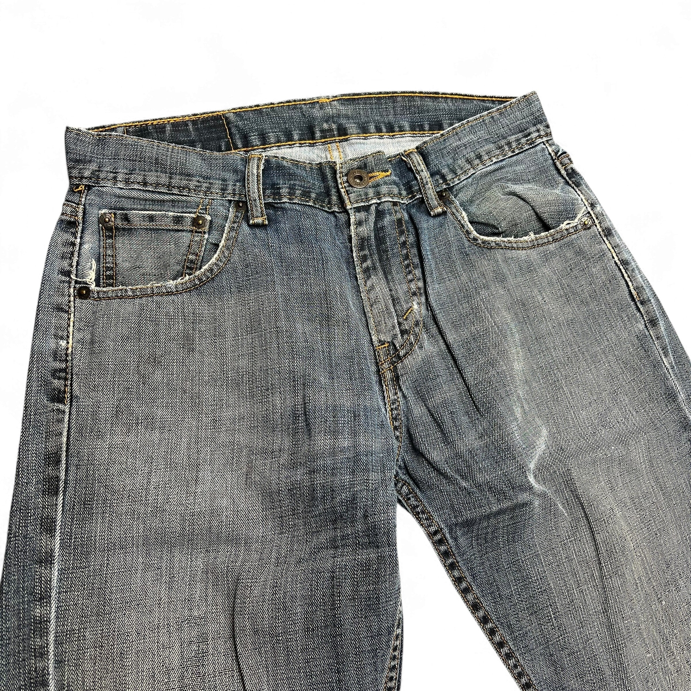 TWC Vintage Levi’s 527 Bootcut Jeans in blauem Denim mit klassischem Five-Pocket-Design und Used-Look