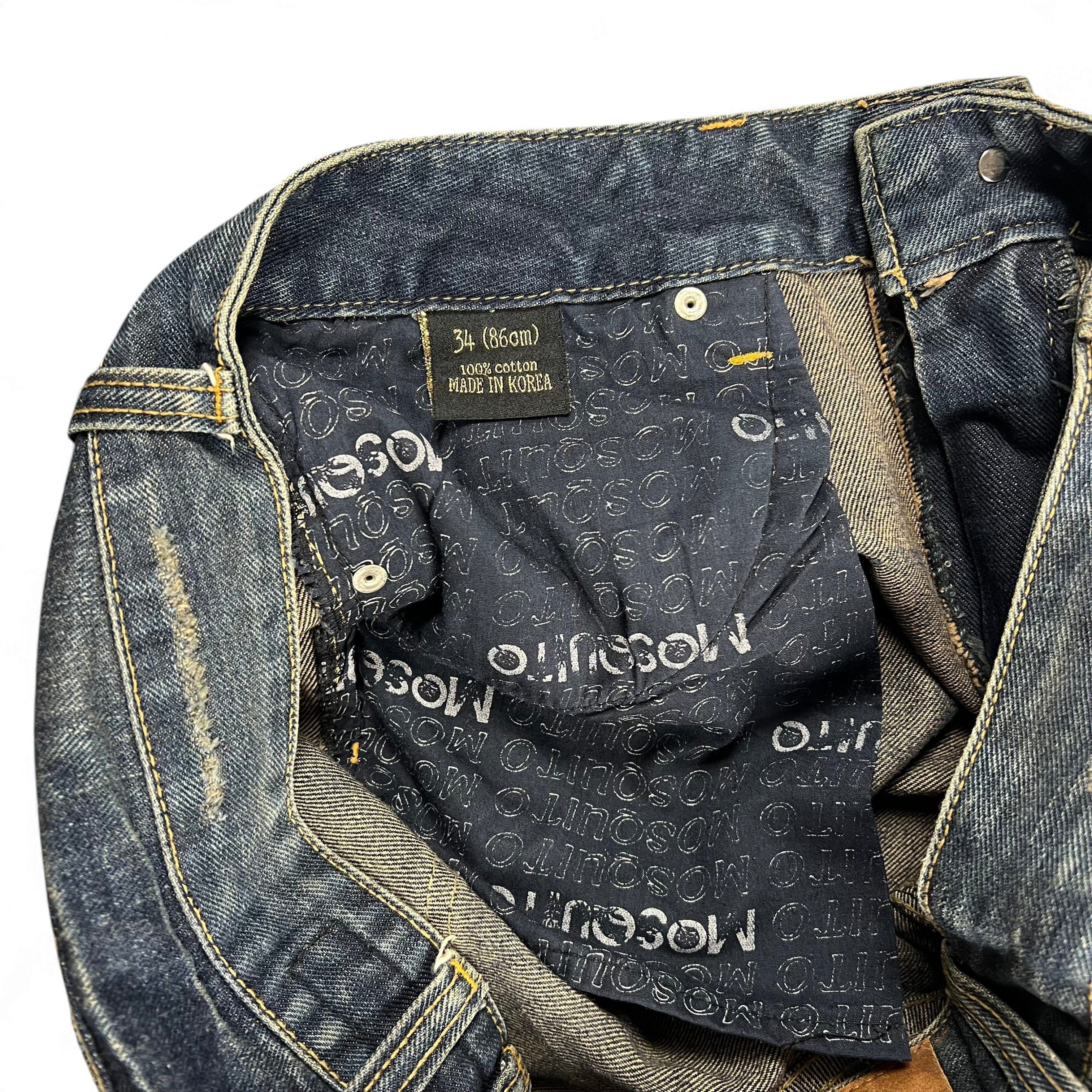 TWC Vintage Mosquito Bootcut Jeans aus gewaschenem Denim mit Logoprint-Innenfutter und Etikett Made in Korea
