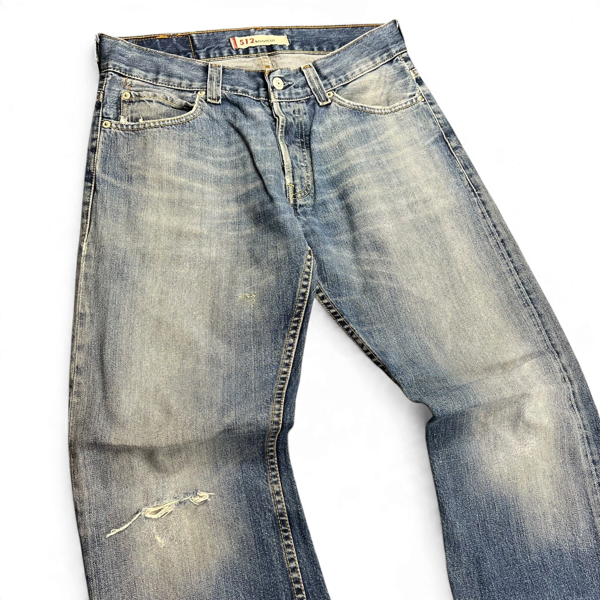 TWC Vintage Levi’s 512 Bootcut Jeans in verwaschenem Blau mit Distressed-Details und klassischem Schnitt
