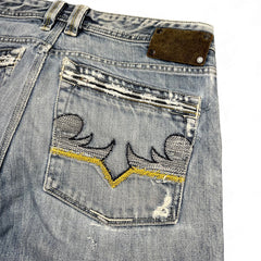 TWC Vintage Diesel Straight Jeans in hellblauem Denim mit bestickter Gesäßtasche und braunem Lederpatch
