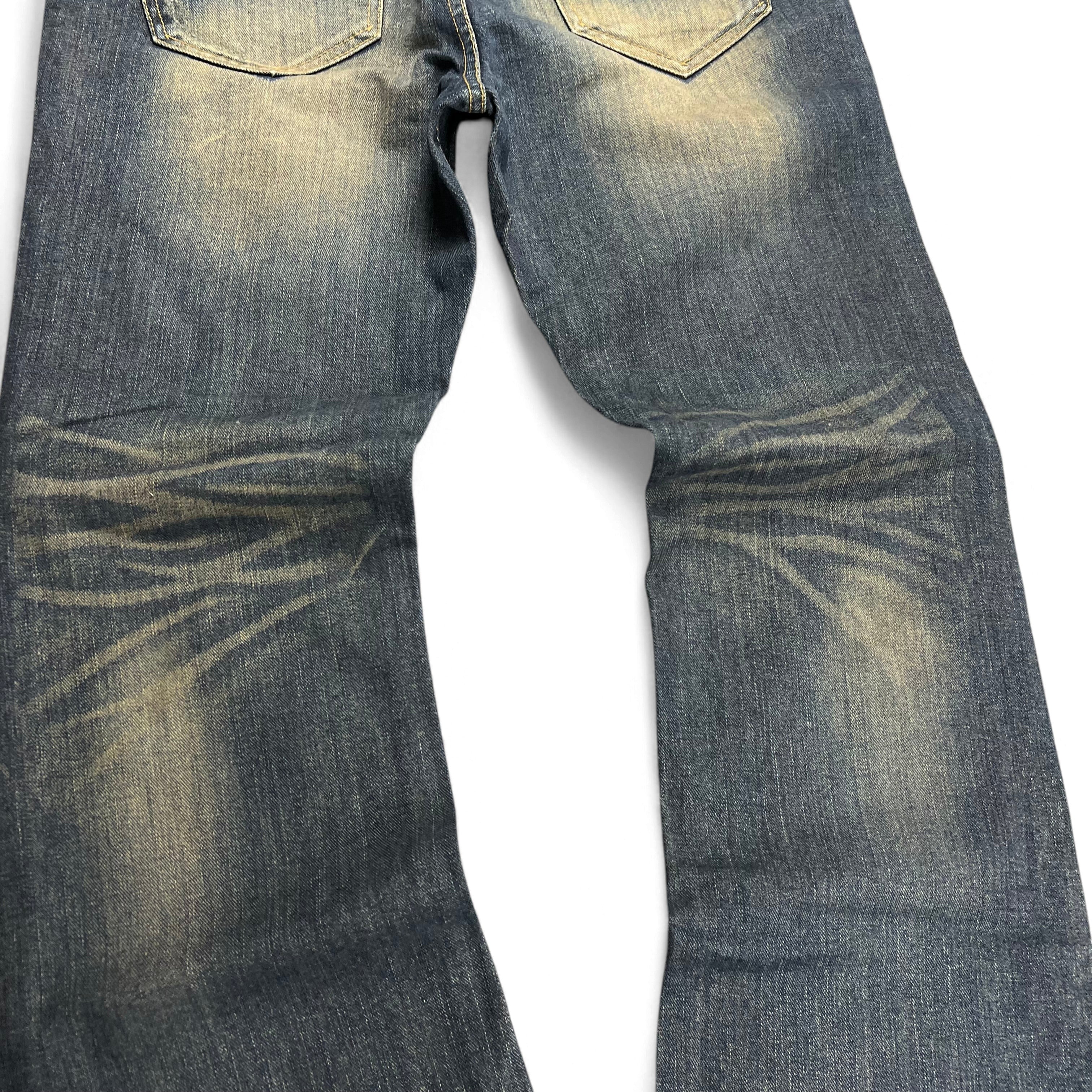 TWC Vintage Mosquito Washed Bootcut Jeans mit verwaschener Optik und markanten Falteneffekten in Blau