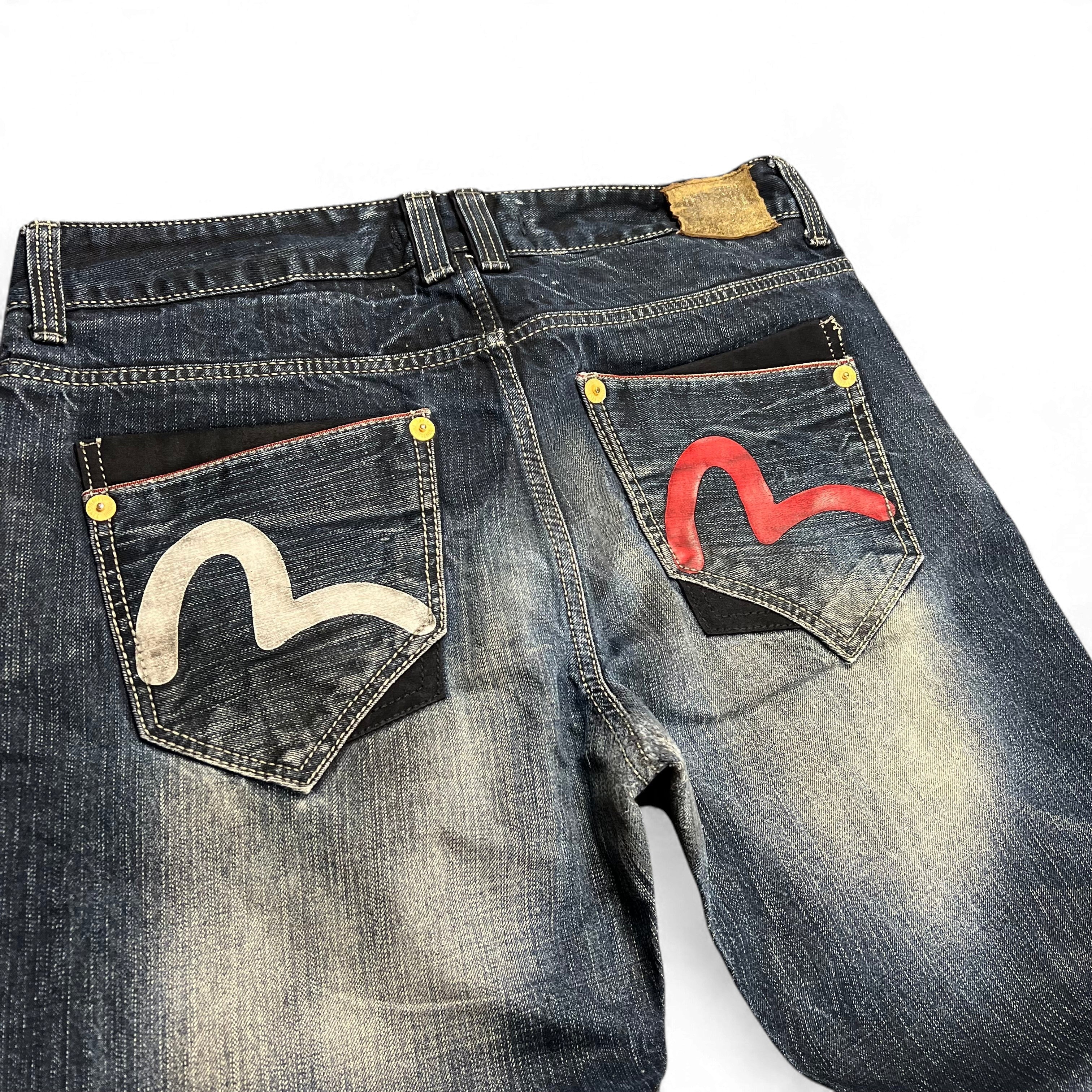 TWC Vintage Evisu KC Straight Jeans mit verwaschenem Denim und ikonischen aufgesetzten Taschen mit Logo-Print