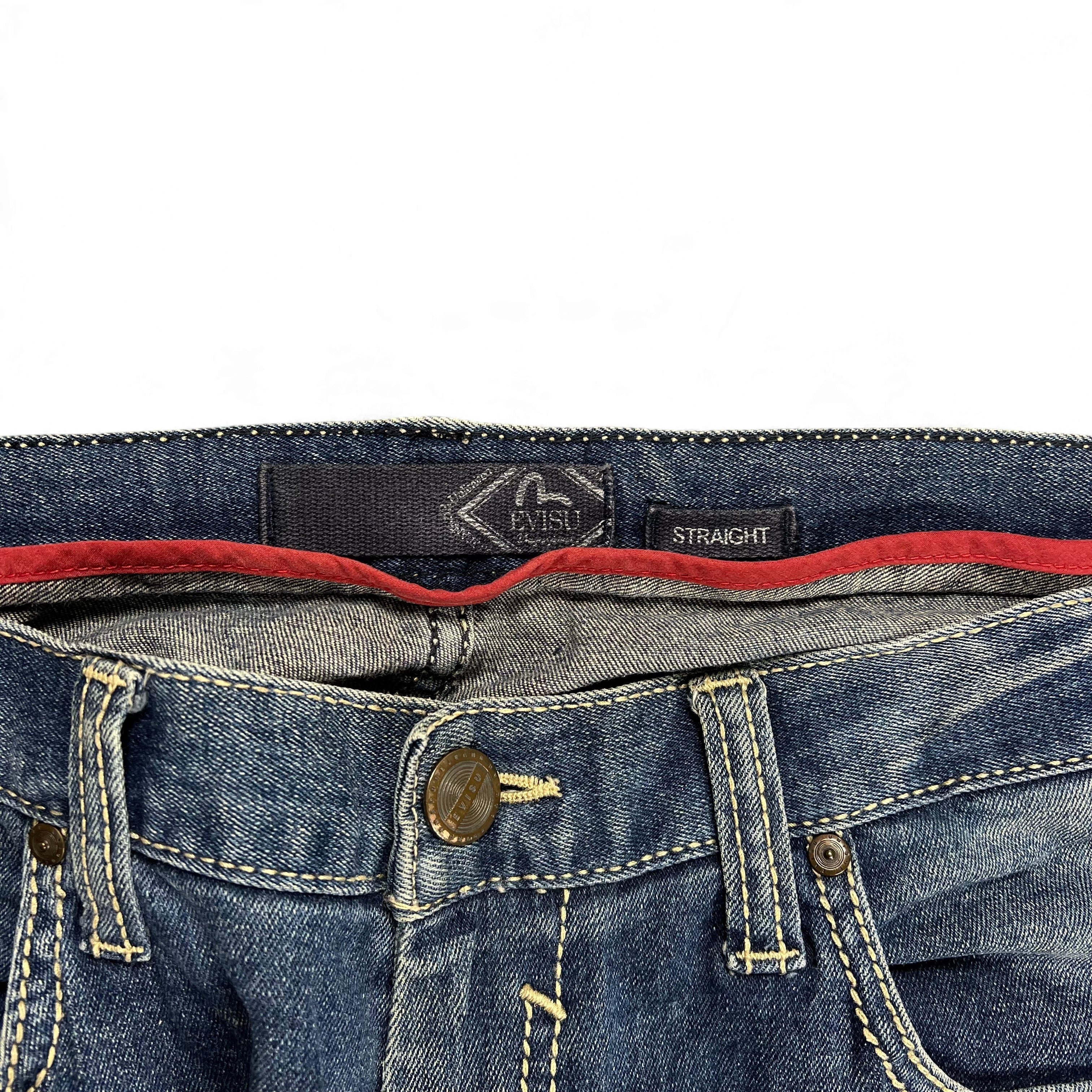 TWC Vintage Evisu KC Straight Jeans mit blauem Denim, rotem Innenfutter und Marken-Label am Bund