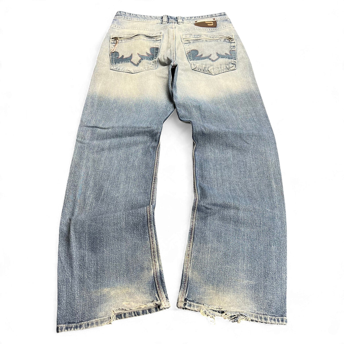 TWC Vintage Diesel Bootcut Jeans in verwaschenem Blau mit Reißverschlusstaschen und ausgefransten Säumen