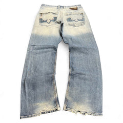 TWC Vintage Diesel Bootcut Jeans in verwaschenem Blau mit Reißverschlusstaschen und ausgefransten Säumen