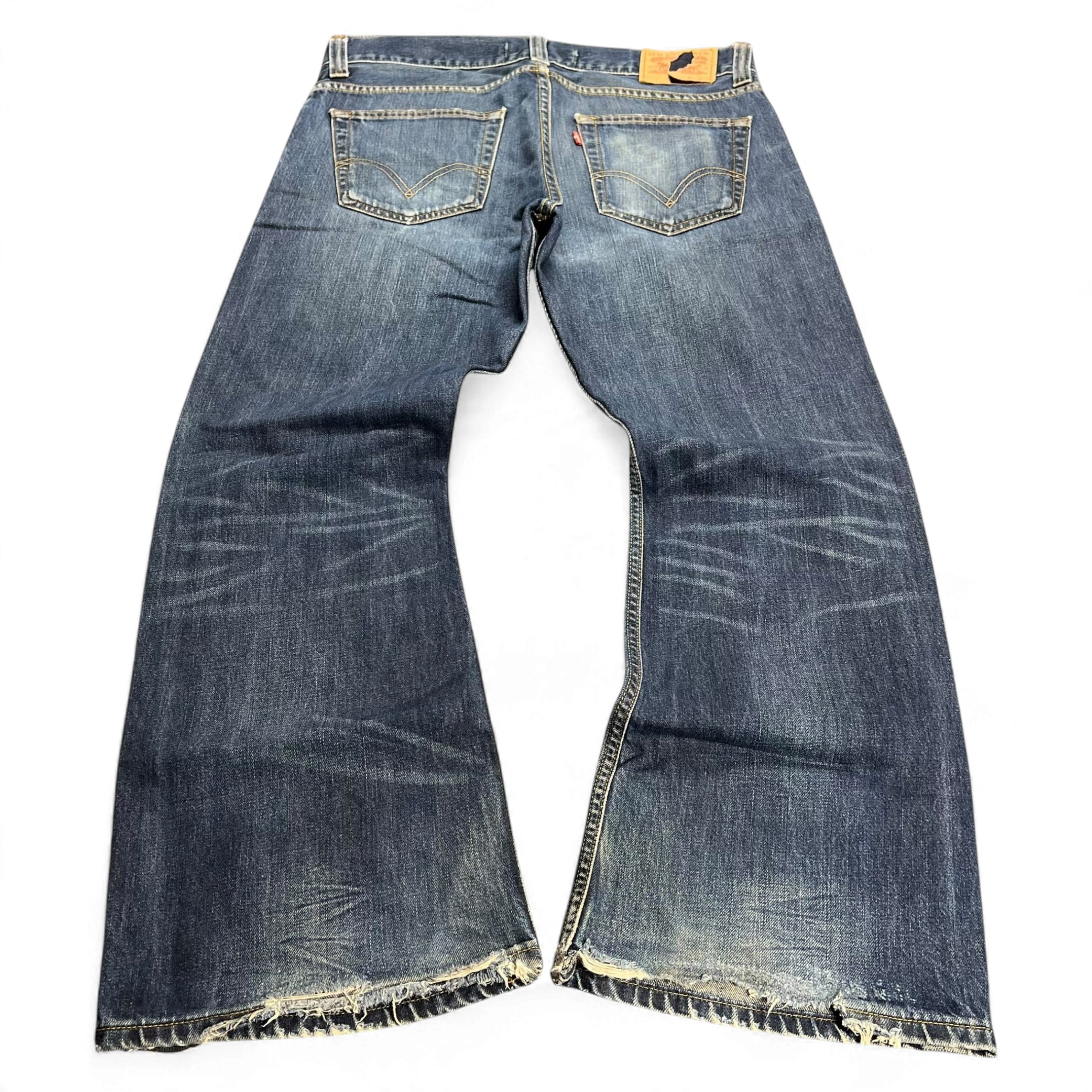 TWC Vintage Levi’s 512 Bootcut Jeans in blauem Denim mit ausgefransten Säumen und klassischer Waschung