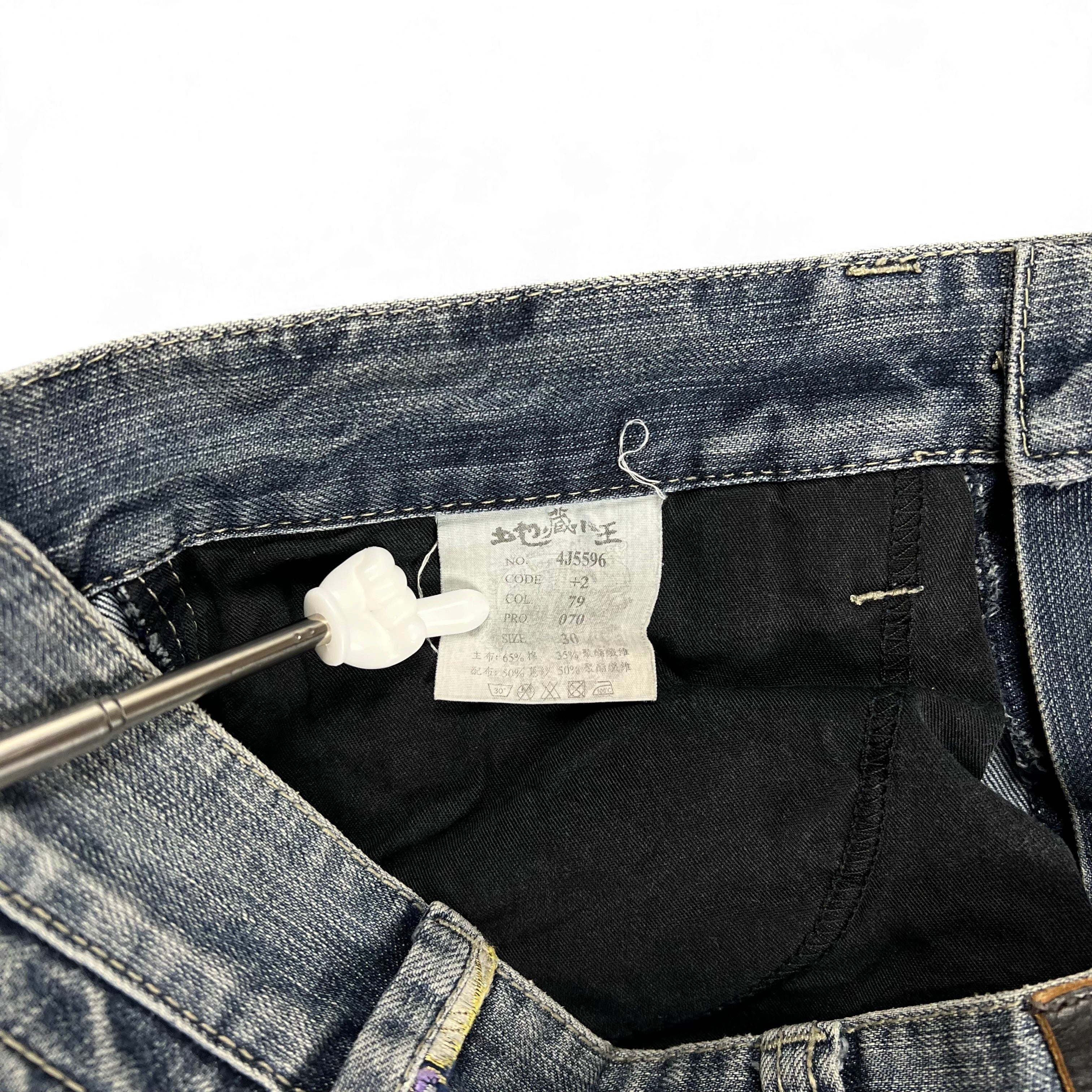 TWC Vintage Jeans mit japanischem Jizo-Stickerei-Etikett und Größenangaben auf dem Innenetikett