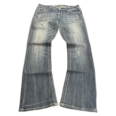 TWC Vintage Damen Y2K Jeans im Baggy Bootcut Schnitt mit verwaschener blauer Optik und hellen Ziernähten