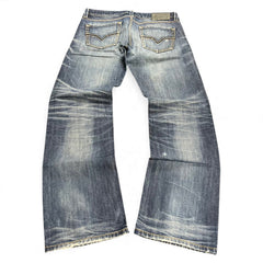 TWC Vintage Diesel Larkee Straight Jeans in verwaschenem Blau mit markanten Gesäßtaschen und geradem Bein