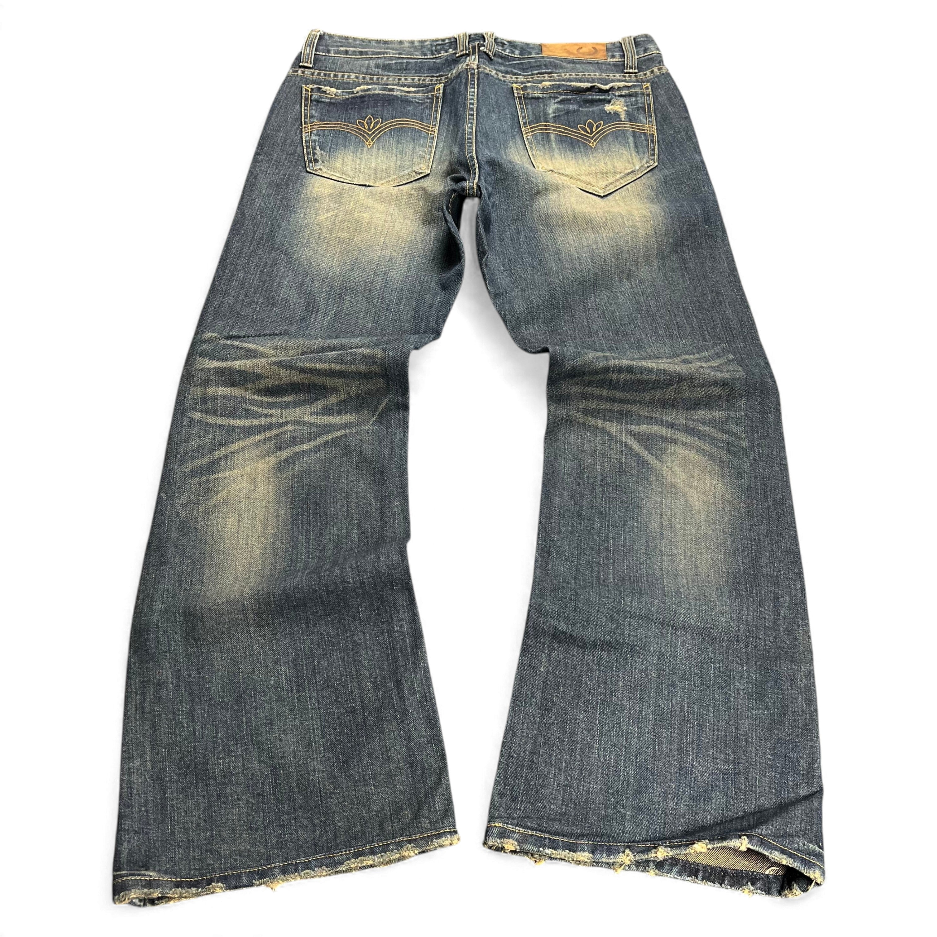 TWC Vintage Bootcut-Jeans in verwaschenem Blau mit Distressed-Details und Ziernähten auf den Gesäßtaschen
