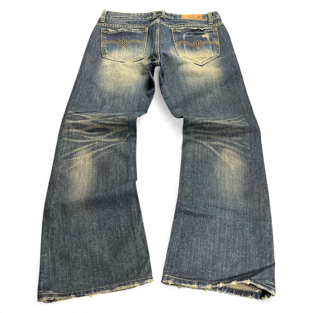 TWC Vintage Bootcut-Jeans in verwaschenem Blau mit Distressed-Details und Ziernähten auf den Gesäßtaschen