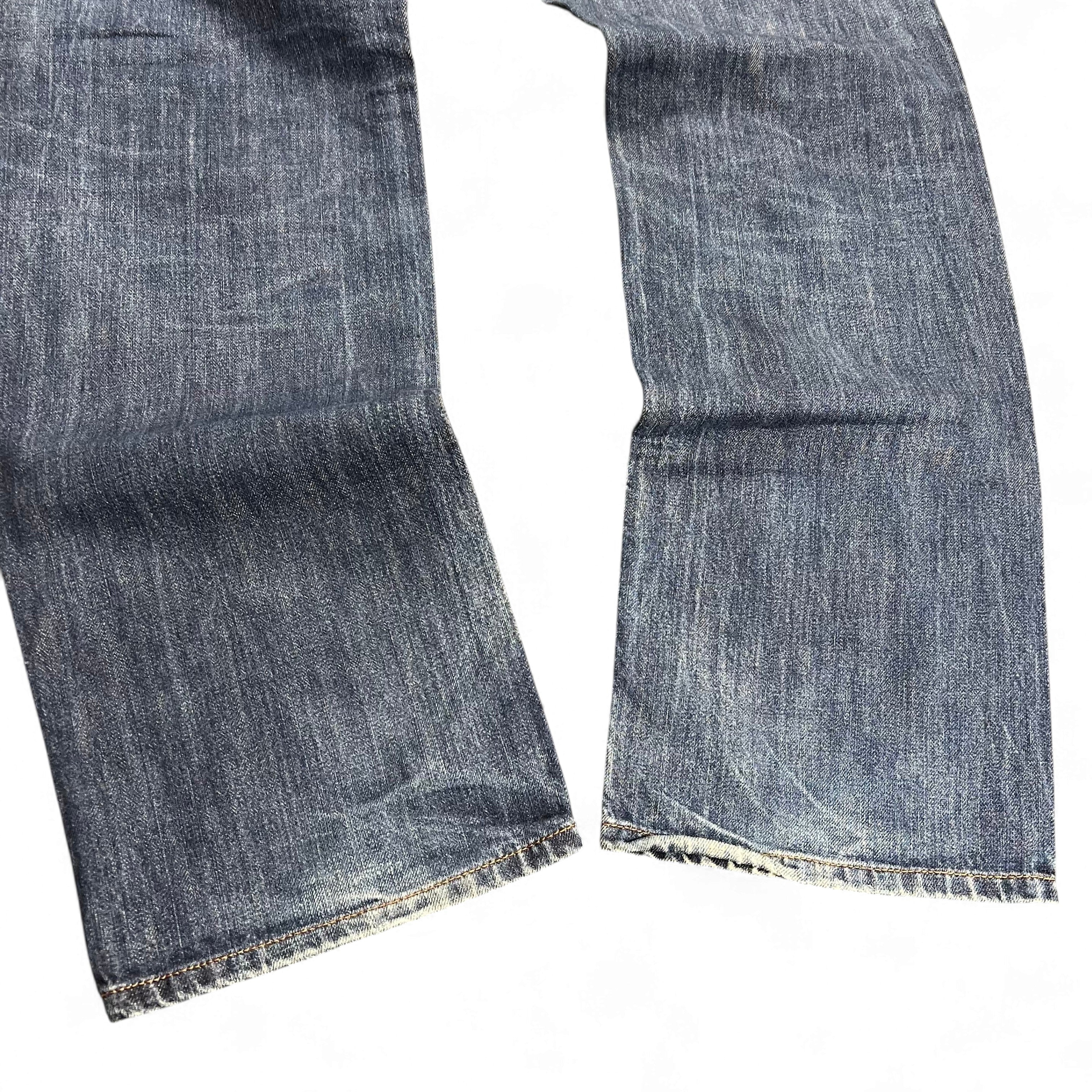 TWC Vintage Diesel Larkee Straight Jeans in verwaschenem Blau mit leicht abgenutzten Säumen