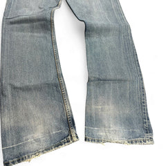 TWC Vintage Levi’s 507 Bootcut Jeans in light blue denim with distressed hem and vintage wash finish