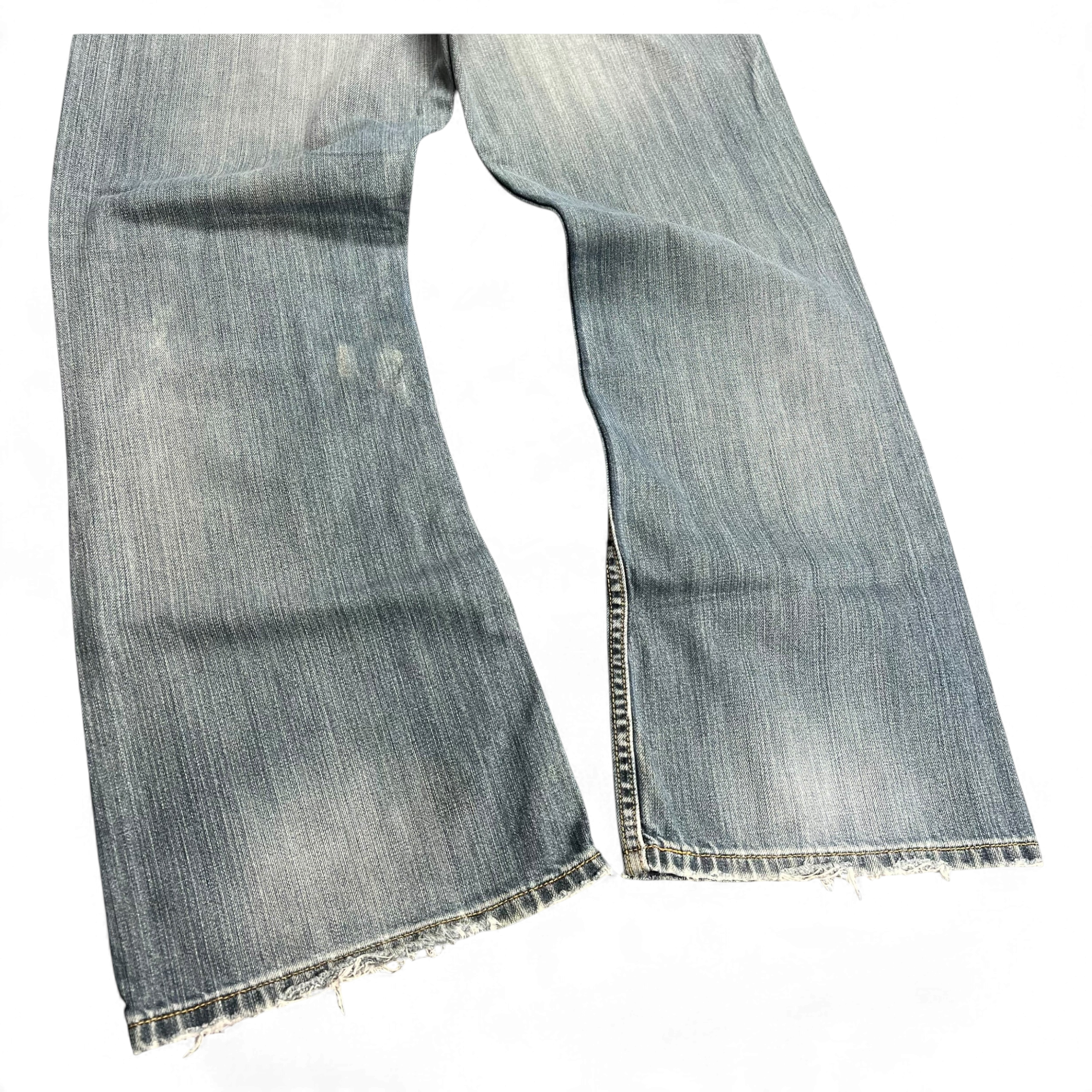 TWC Vintage Levi’s 527 Bootcut Jeans in verwaschenem Blau mit ausgefransten Säumen