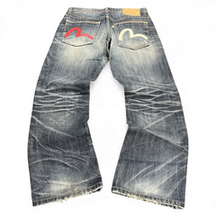 TWC Vintage Evisu Jeans mit geradem Schnitt, verwaschenem Denim und ikonischen roten und weißen Seagull-Taschen