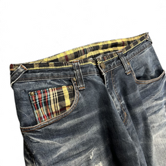 TWC Vintage Evisu Jeans mit geradem Schnitt, verwaschenem Denim und kariertem Innenfutter an Taschen und Bund