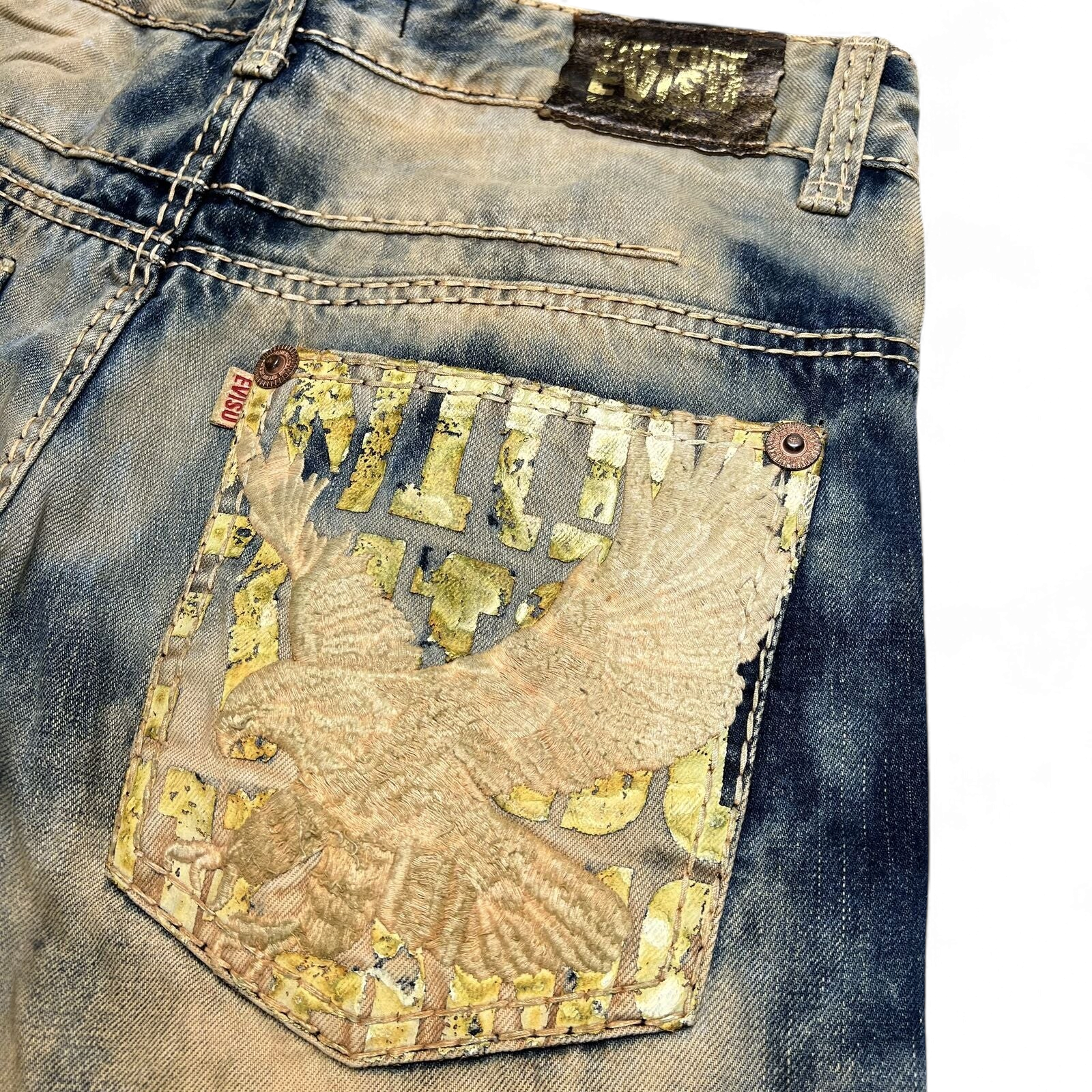 TWC Vintage Evisu Straight Jeans mit verwaschener blauer Waschung und aufwendiger Adler-Stickerei auf der Gesäßtasche