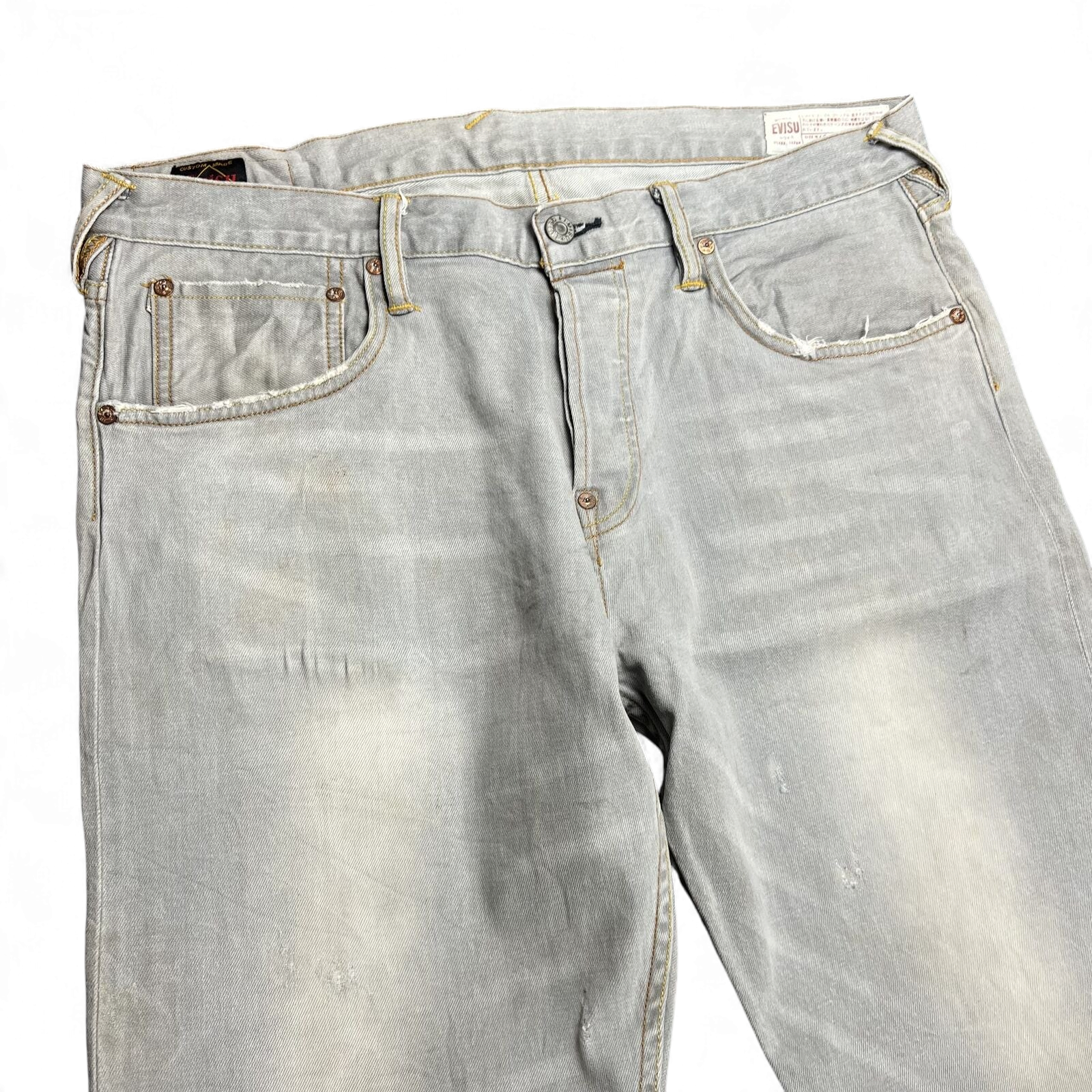 TWC Vintage Evisu Straight Jeans in verwaschenem Hellgrau mit Used-Look und klassischen Nieten-Details