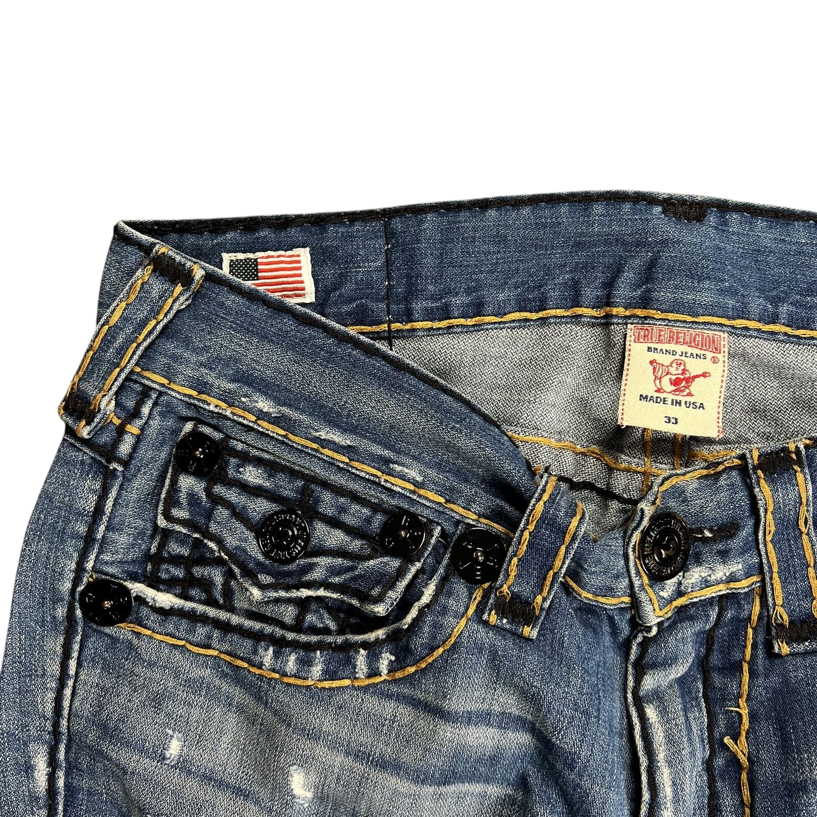 TWC Vintage True Religion Straight Jeans in Blau mit markanten Kontrastnähten und US-Flaggen-Label am Innenbund