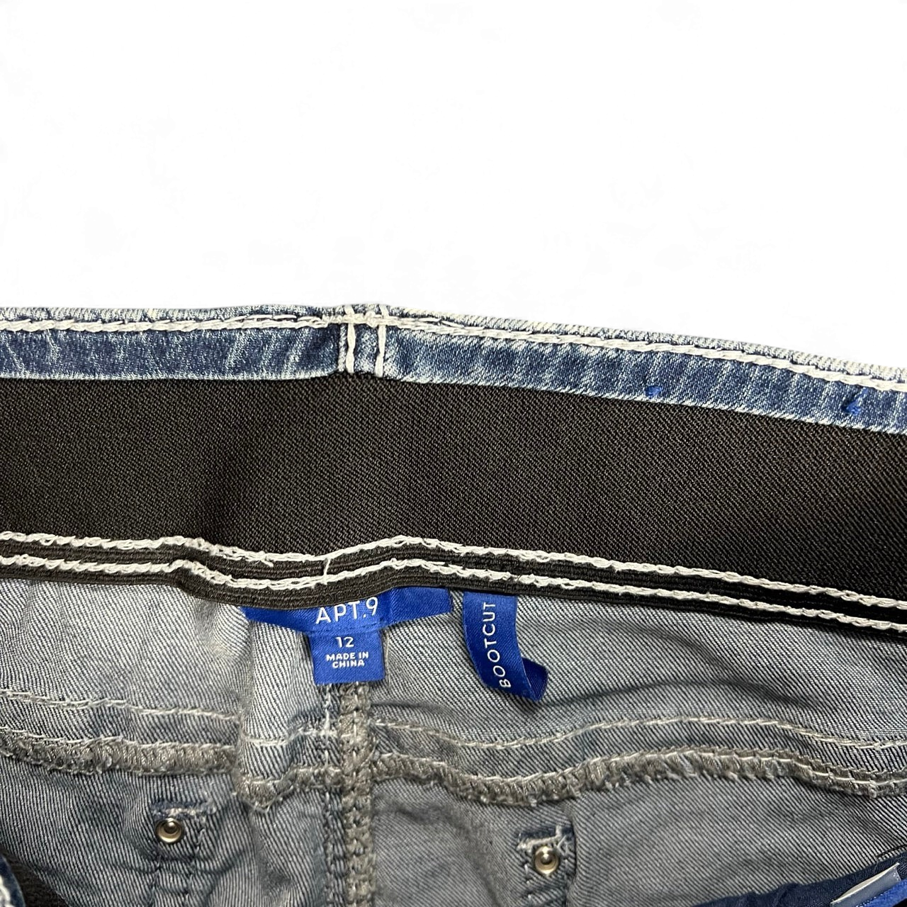TWC Vintage Damen Y2K Bootcut Jeans mit schwarzem elastischem Bund und blauen Denim Details