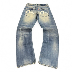 TWC Vintage women's straight leg denim jeans with iconic white painted seagull back pocket logos and distressed wash.