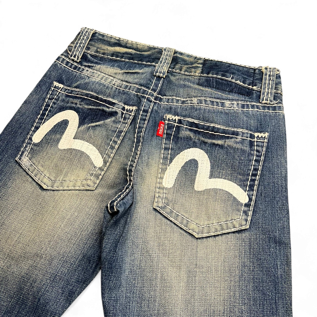 TWC Vintage Evisu straight leg jeans in faded blue denim with iconic white painted seagull back pocket logos