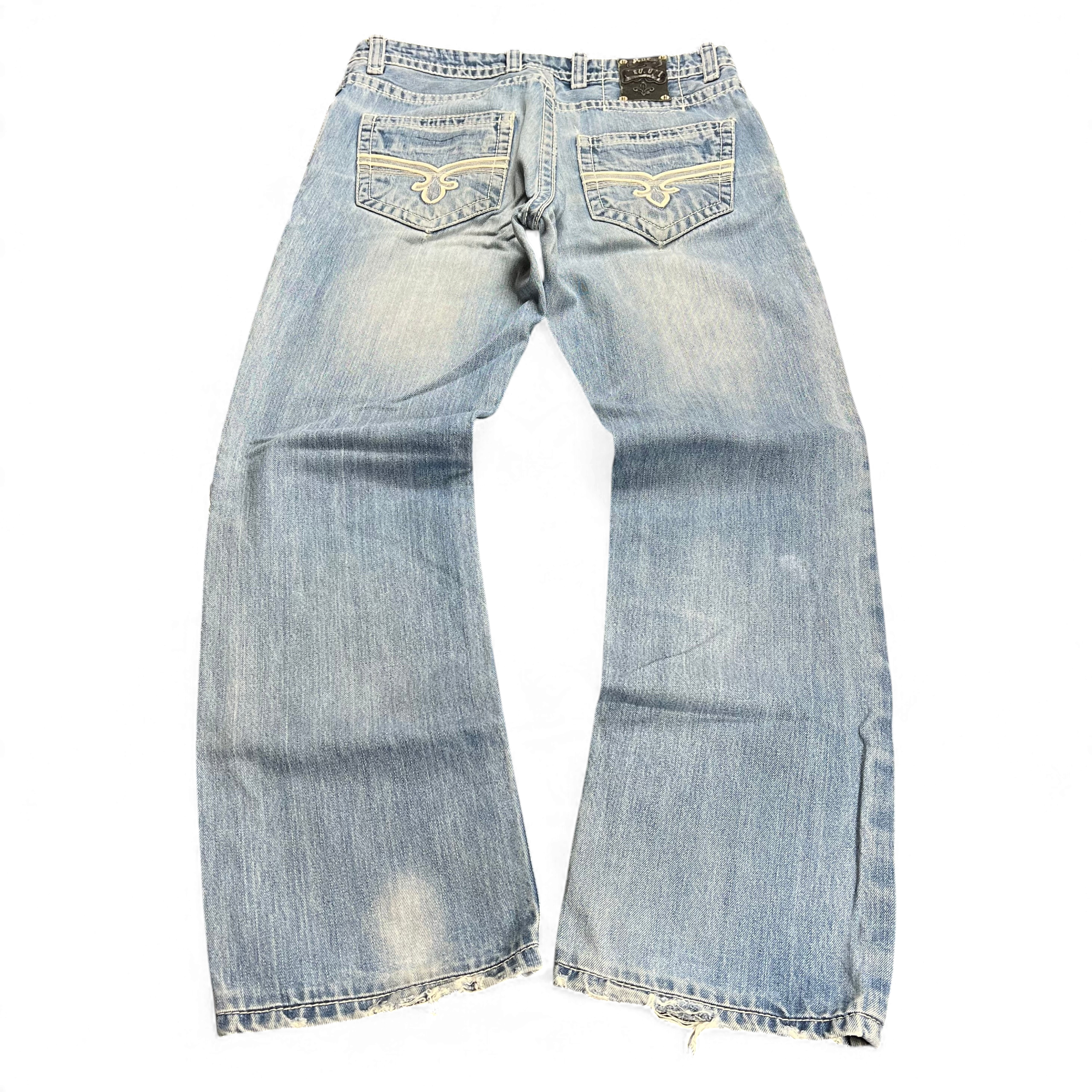 TWC Vintage Rock Revival Baggy Jeans in hellblauem Denim mit bestickten Gesäßtaschen und ausgefransten Säumen