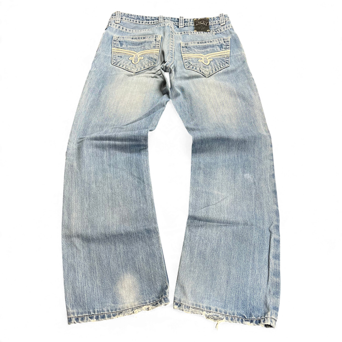 TWC Vintage Rock Revival Baggy Jeans in hellblauem Denim mit bestickten Gesäßtaschen und ausgefransten Säumen