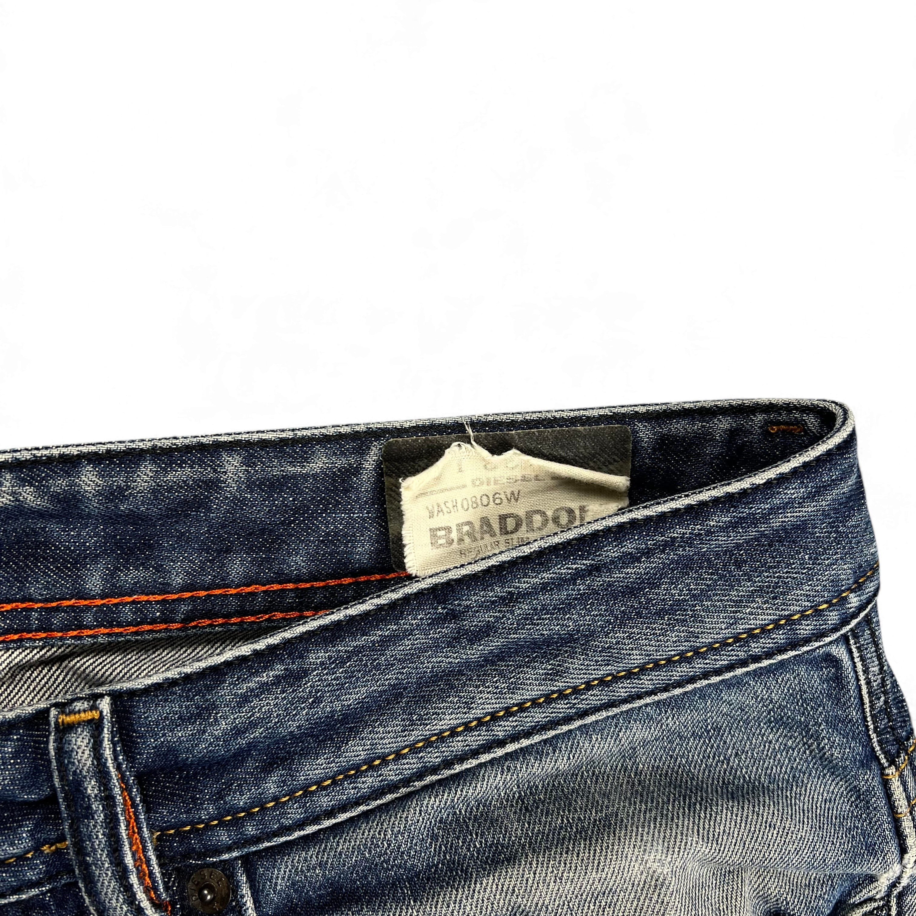 TWC Vintage Diesel Straight Jeans mit blauem Denim und orangefarbenen Kontrastnähten am Bund