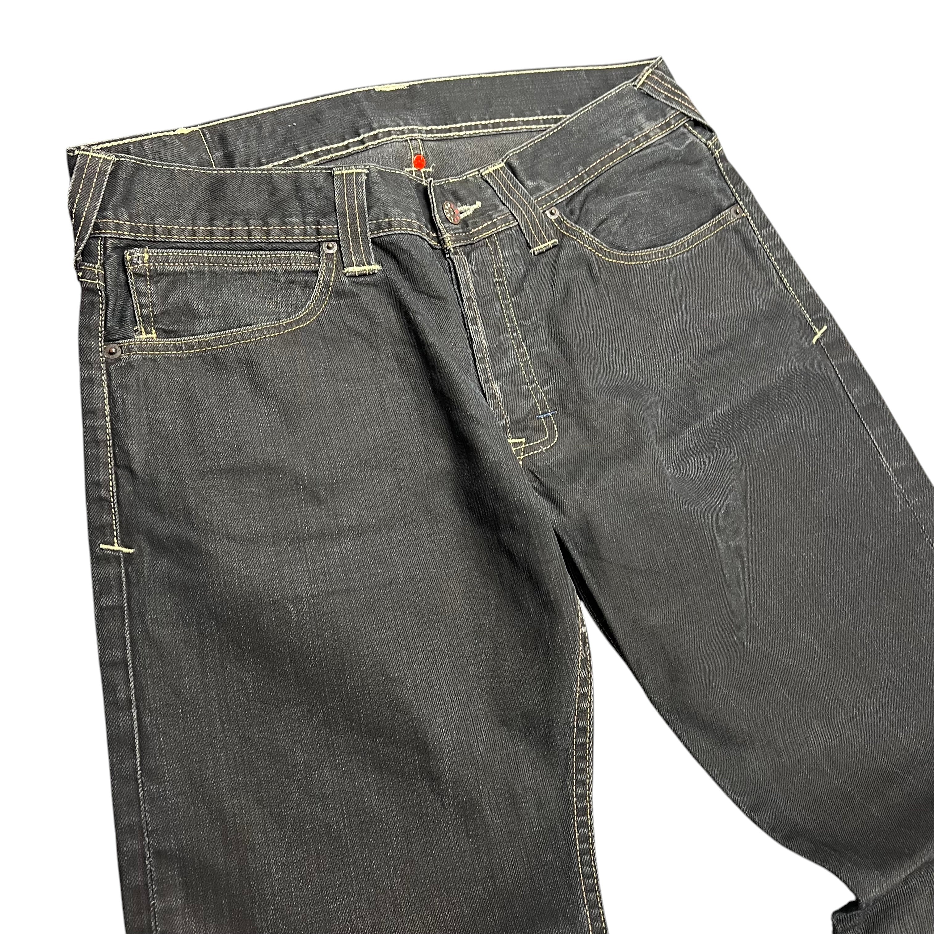 TWC Vintage Evisu x Puma Bootcut Jeans in dunkelblauem Denim mit Kontrastnähten und klassischem Schnitt