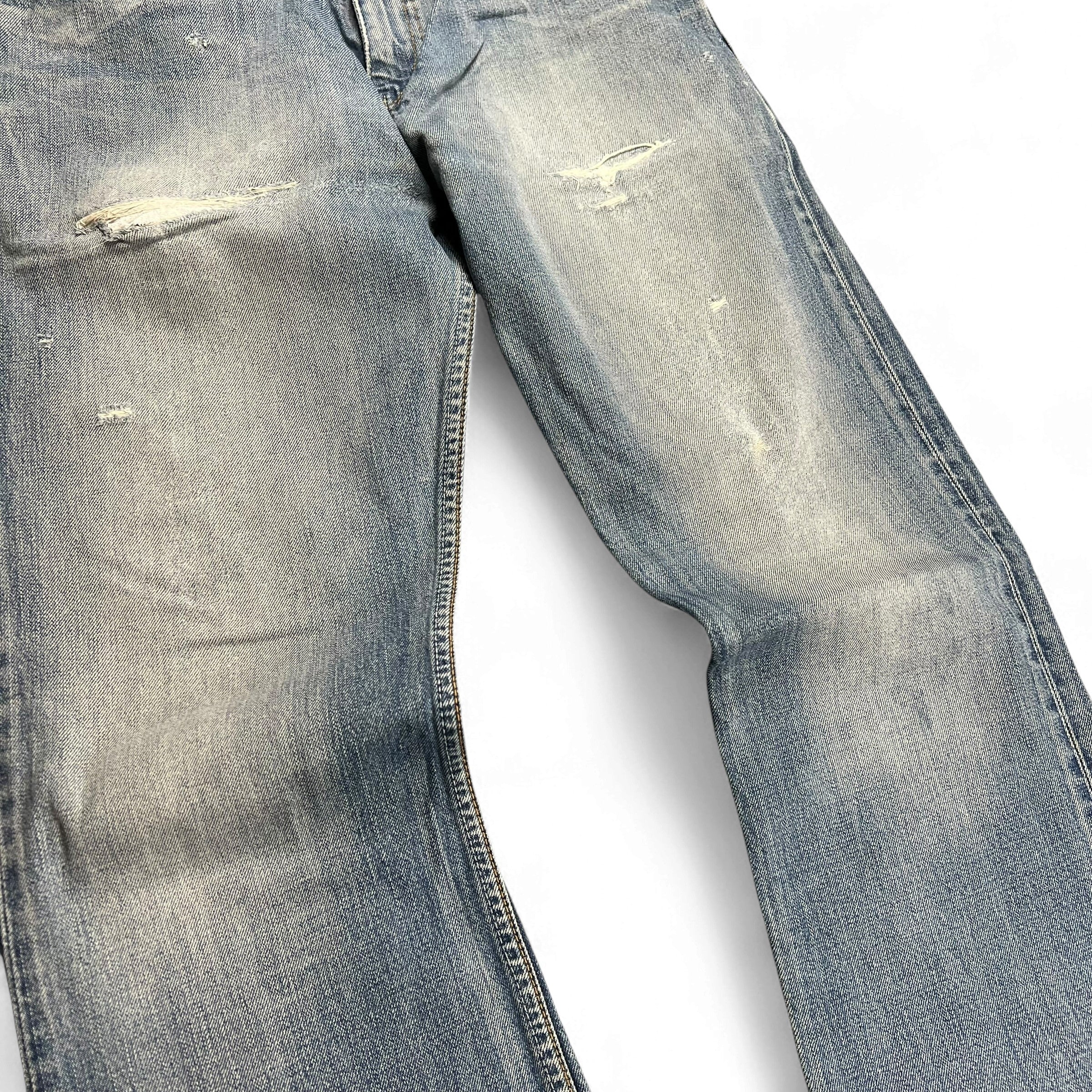 TWC Vintage Levi’s 507 Bootcut Jeans in hellblauem Denim mit Distressed-Details und Abnutzungsspuren