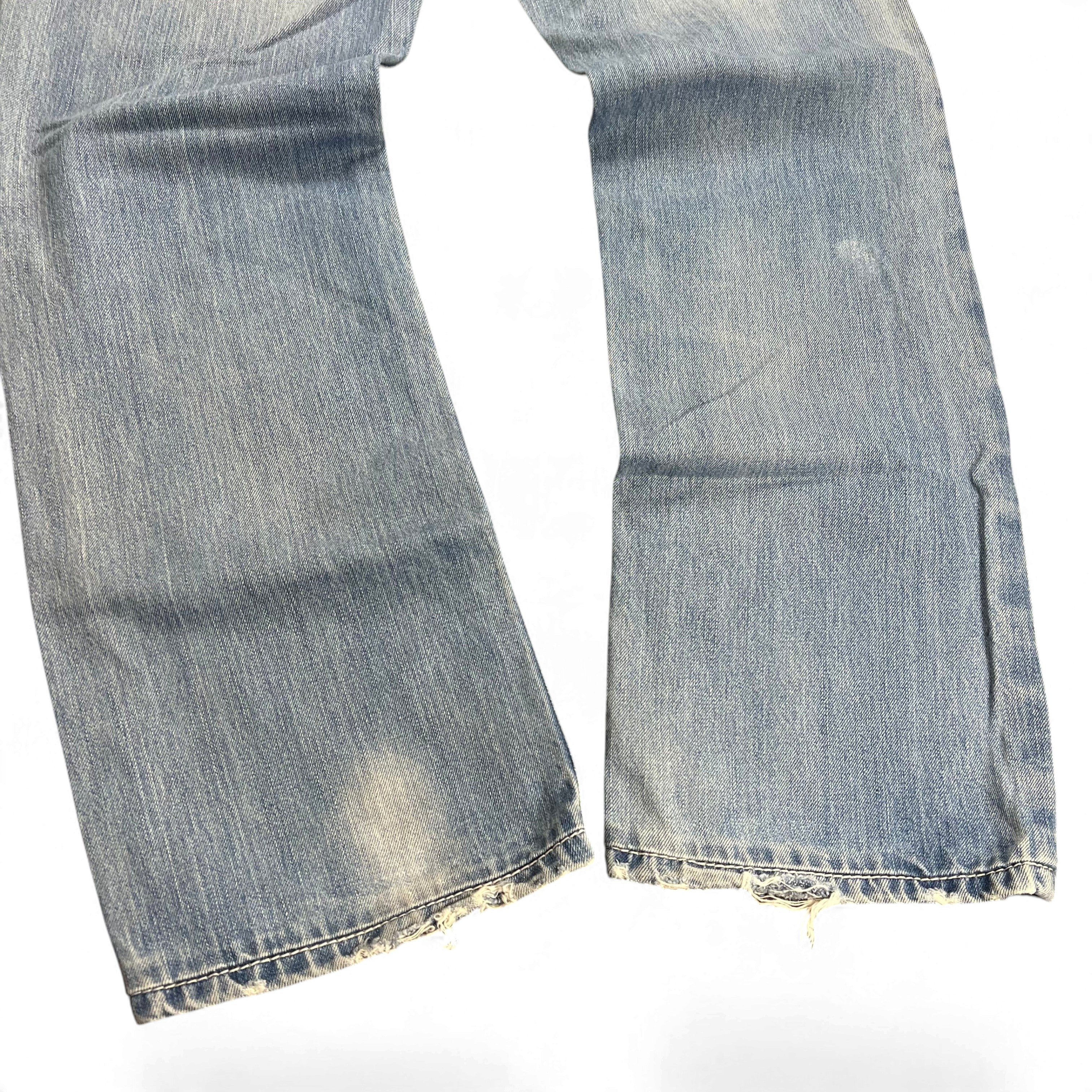 TWC Vintage Rock Revival Baggy Jeans in hellblauem Denim mit Distressed-Details an den Beinabschlüssen