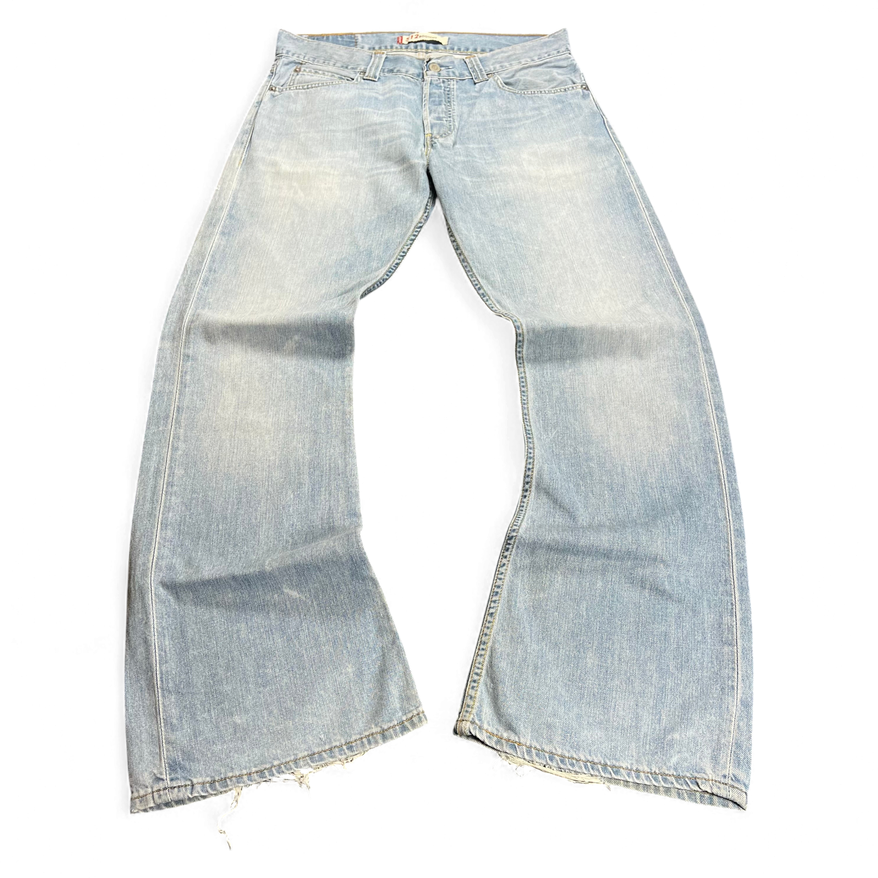 TWC Vintage hellblaue Jeans mit weitem Bein und ausgefransten Saumkanten im Used-Look