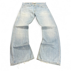 TWC Vintage hellblaue Jeans mit weitem Bein und ausgefransten Saumkanten im Used-Look
