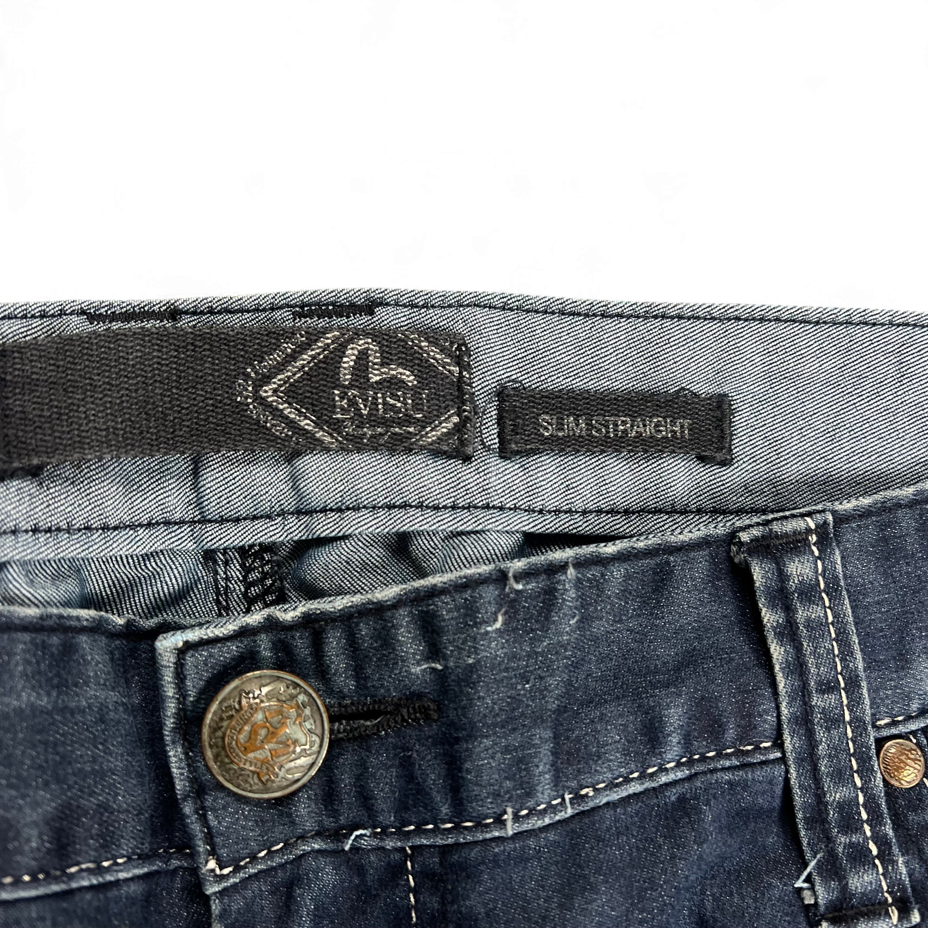 TWC Vintage Evisu KC Straight Jeans mit dunkelblauem Denim-Stoff und Marken-Label am Bund