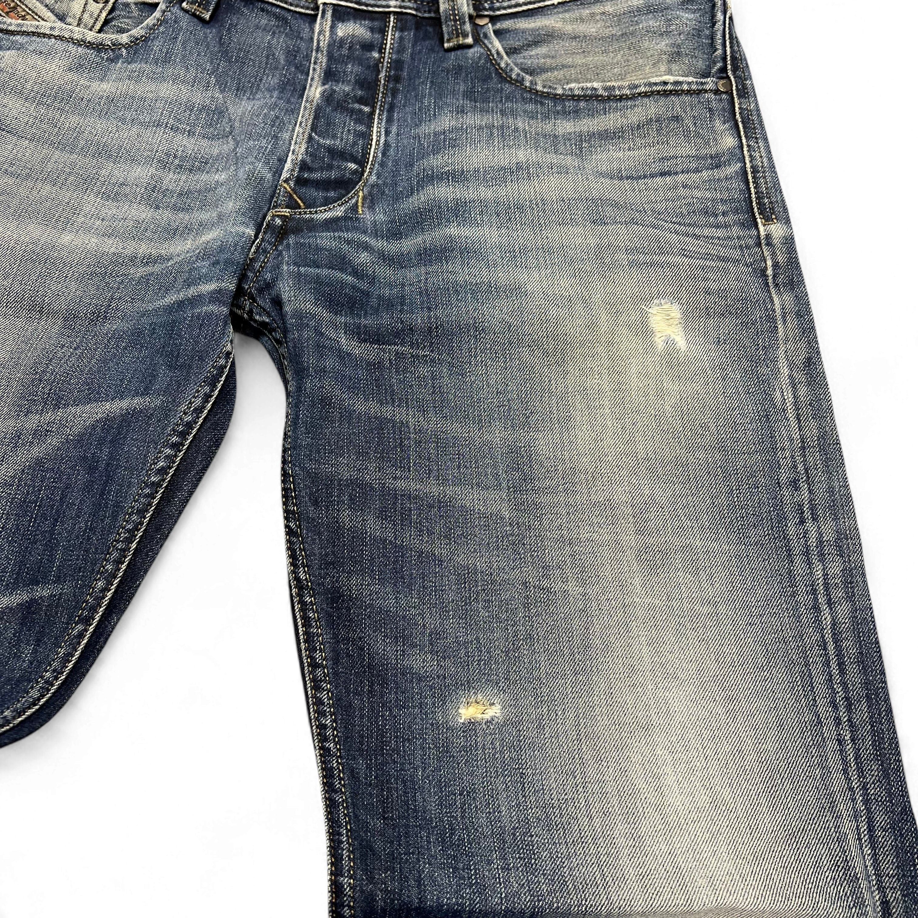 TWC Vintage Diesel Larkee Straight Jeans in blauem Denim mit Used-Look und leichten Abnutzungsspuren