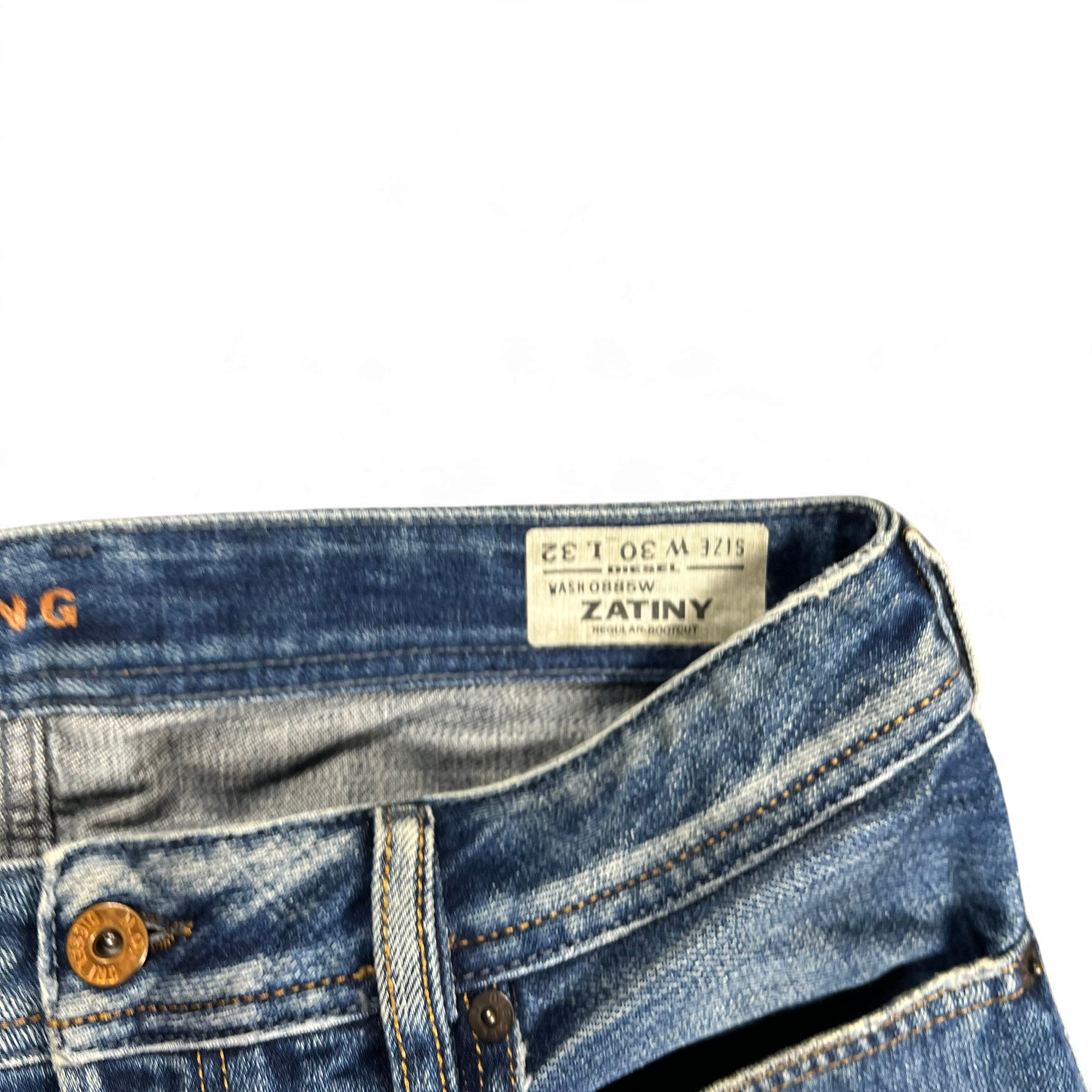 TWC Vintage Diesel Zatiny Bootcut Jeans in verwaschenem Blau mit Innenetikett und kupferfarbenem Knopf