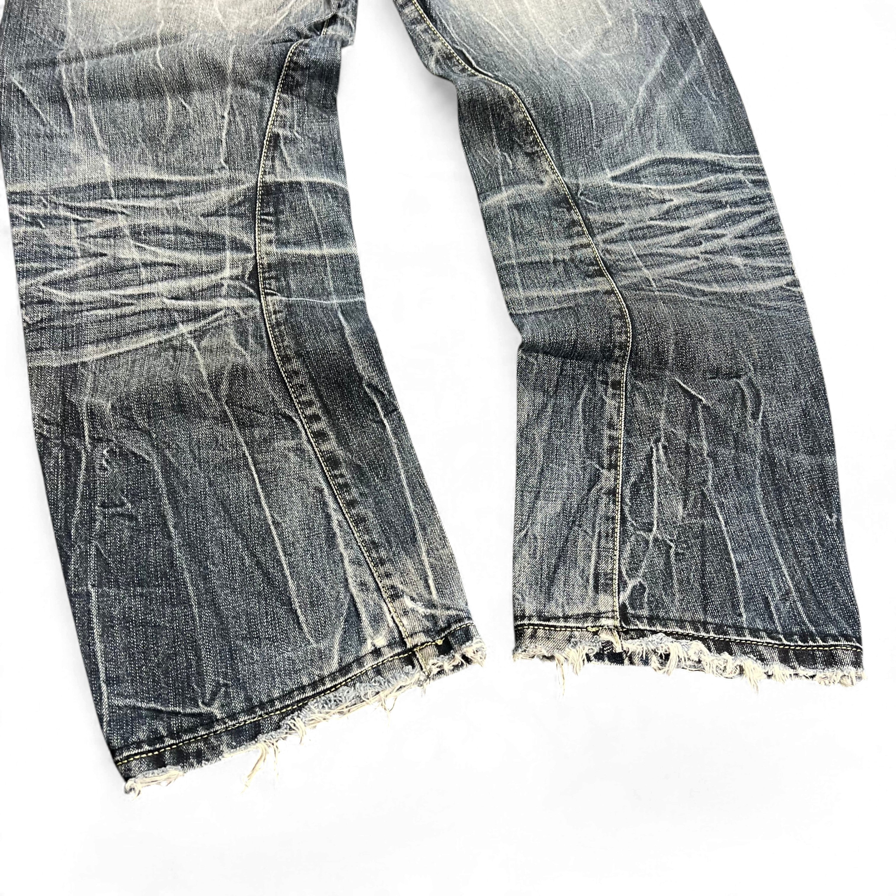 TWC Vintage Evisu KC Baggy Jeans mit starker Waschung und ausgefransten Beinabschlüssen