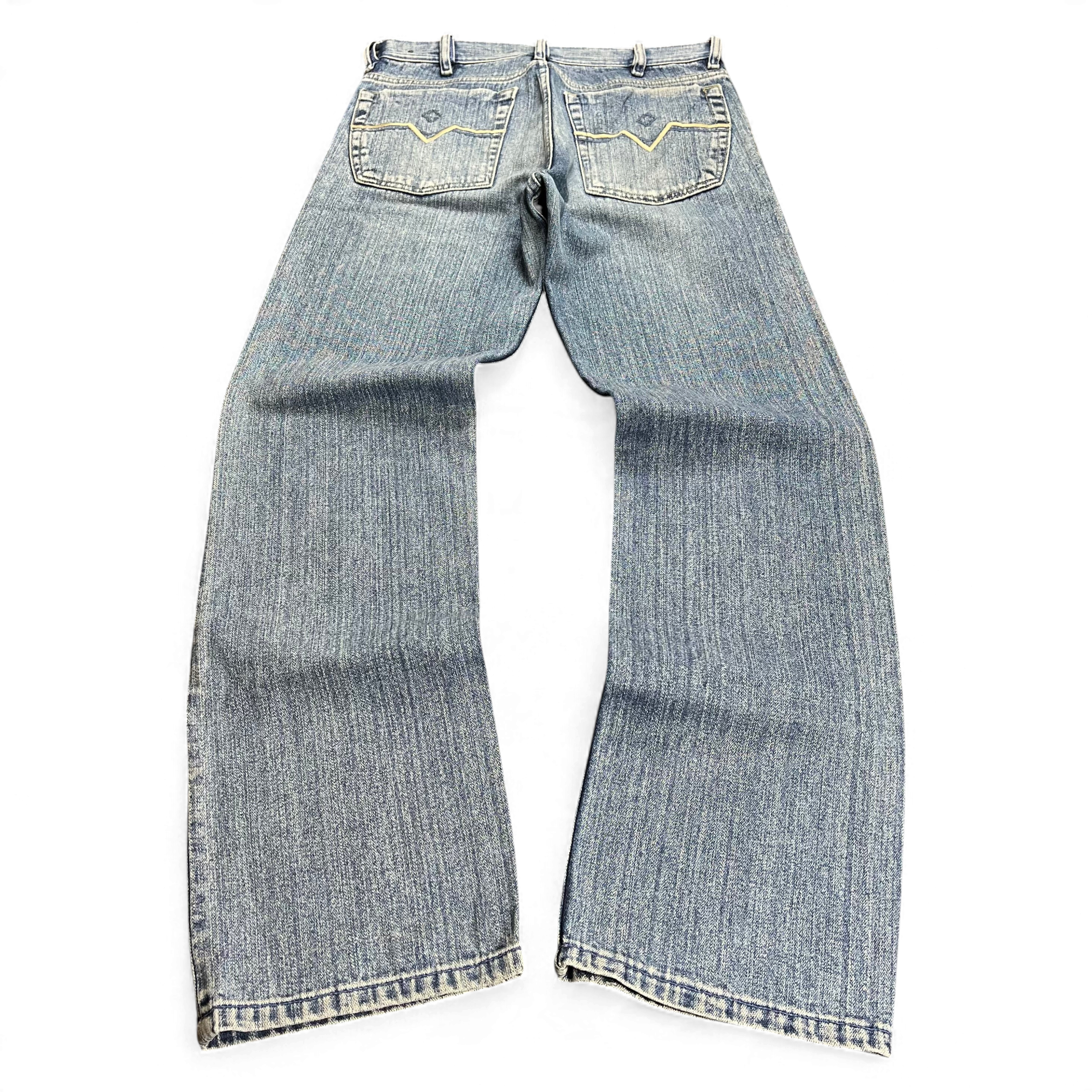 TWC Vintage Diesel Straight Jeans in blauem Denim mit geradem Bein und markanten Ziernähten auf den Gesäßtaschen
