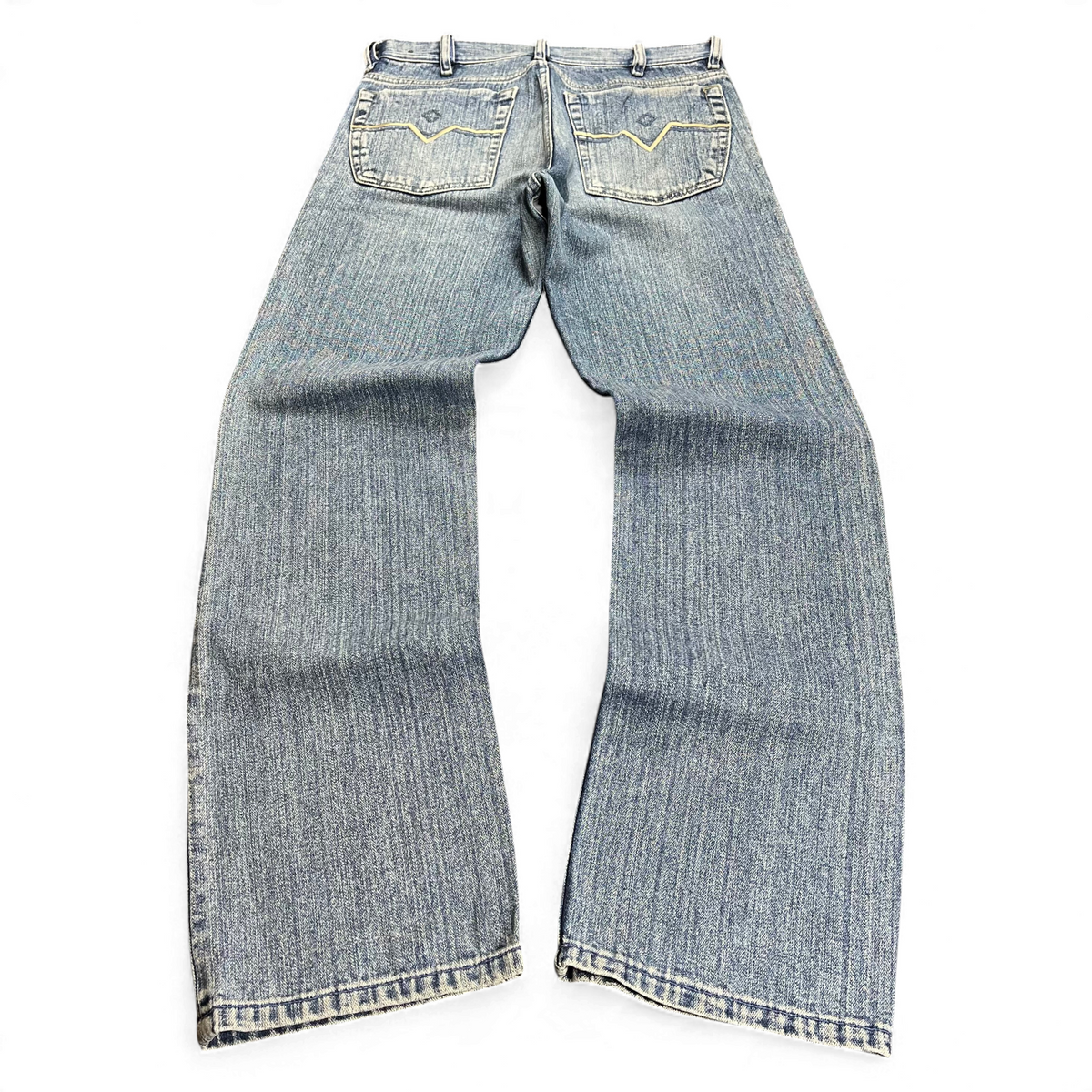 TWC Vintage Diesel Straight Jeans in blauem Denim mit geradem Bein und markanten Ziernähten auf den Gesäßtaschen