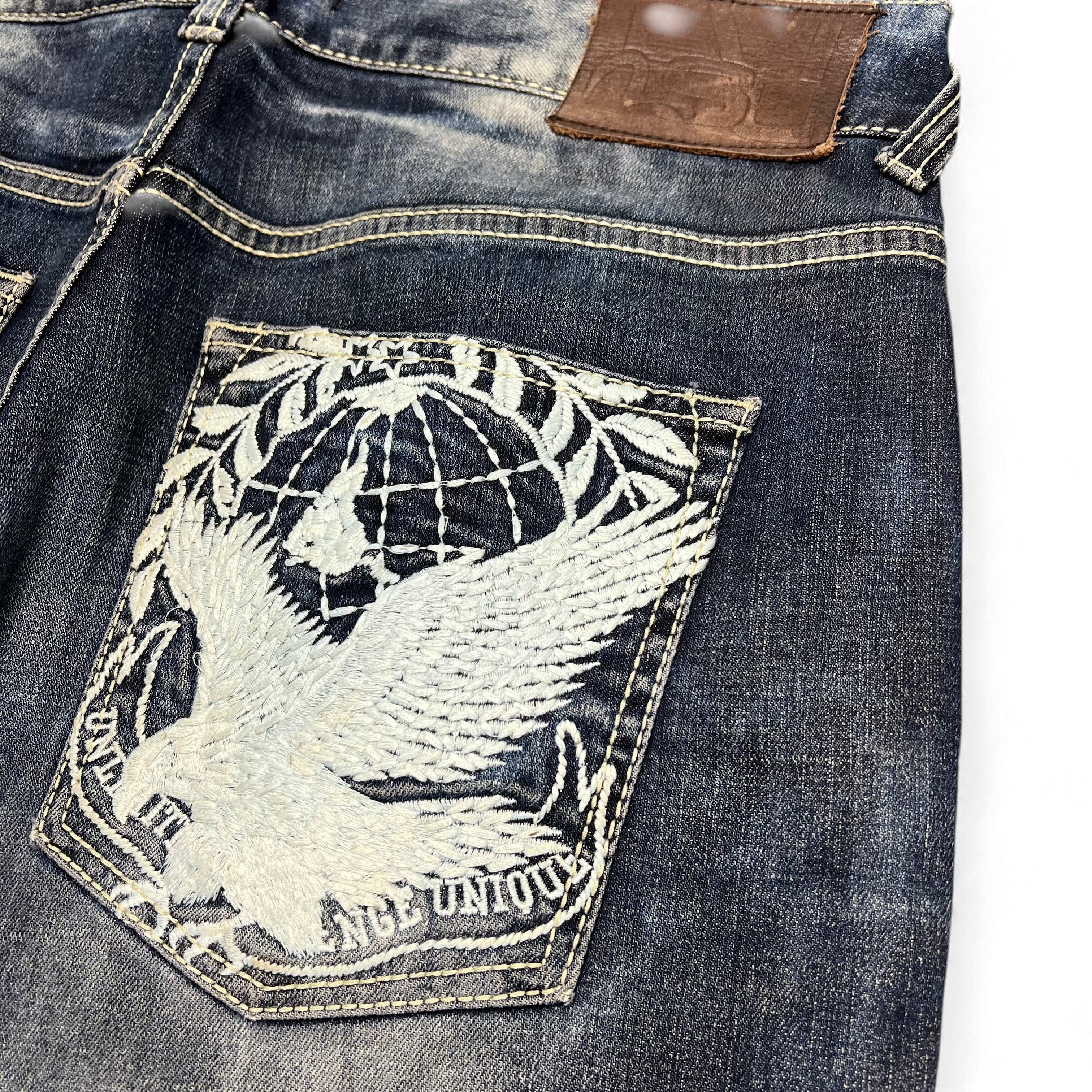 TWC Vintage Evisu KC Baggy Jeans in Dunkelblau mit aufwendiger weißer Adler-Stickerei auf der Gesäßtasche