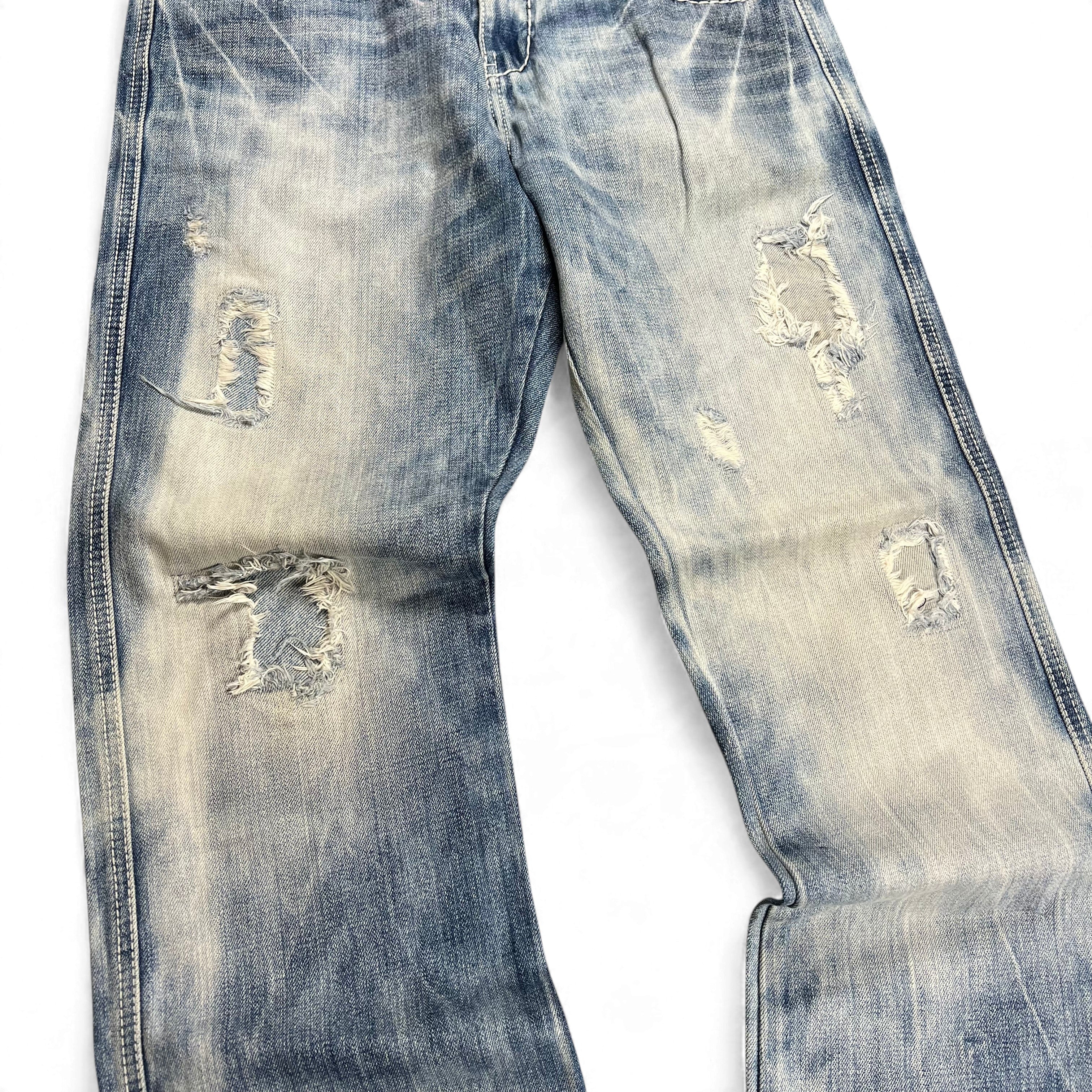 TWC Vintage Evisu KC Baggy Jeans in verwaschenem Blau mit Distressed-Details und Rissen im Vintage-Look