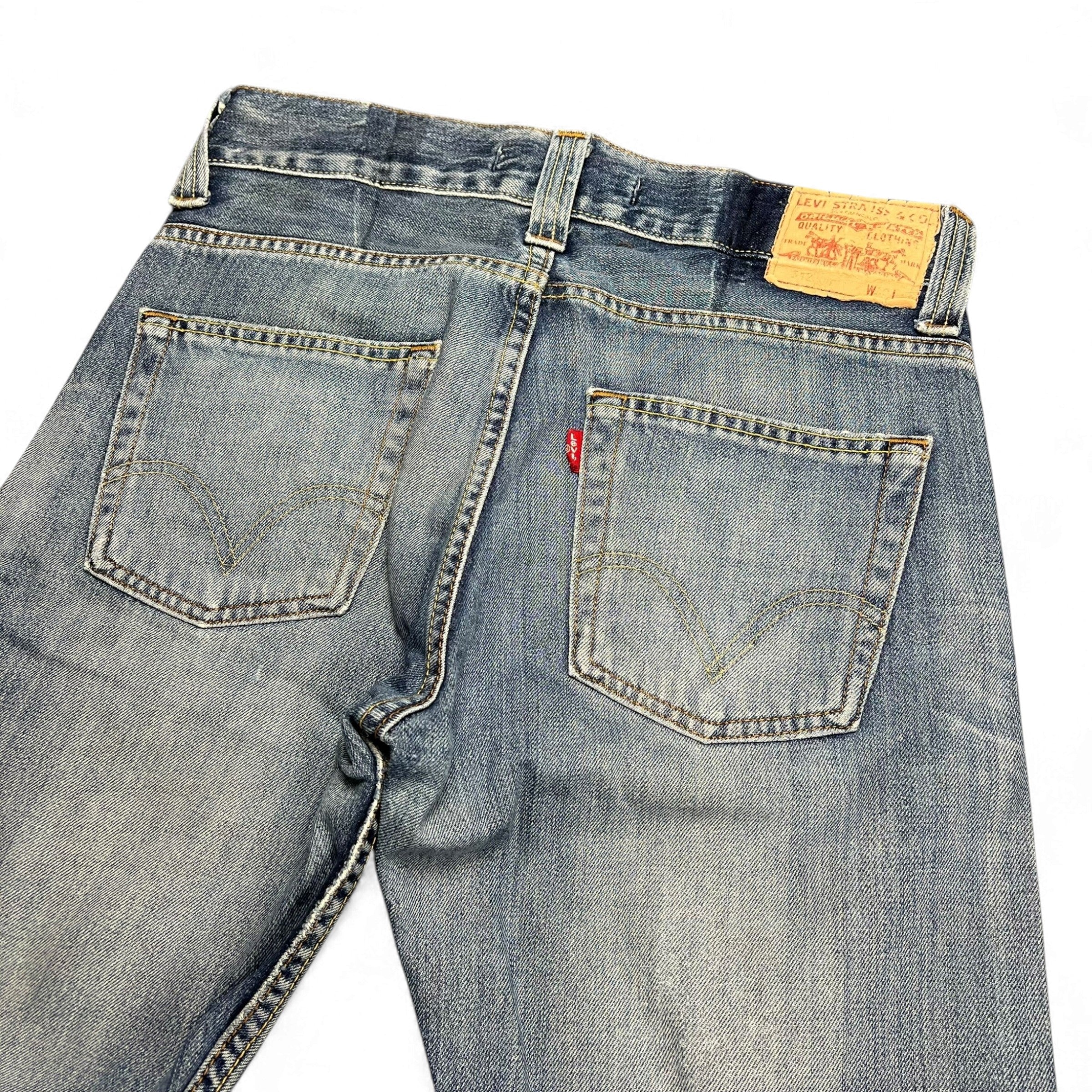TWC Vintage Levi's 512 Bootcut Jeans in dirty wash denim with back pockets and leather patch