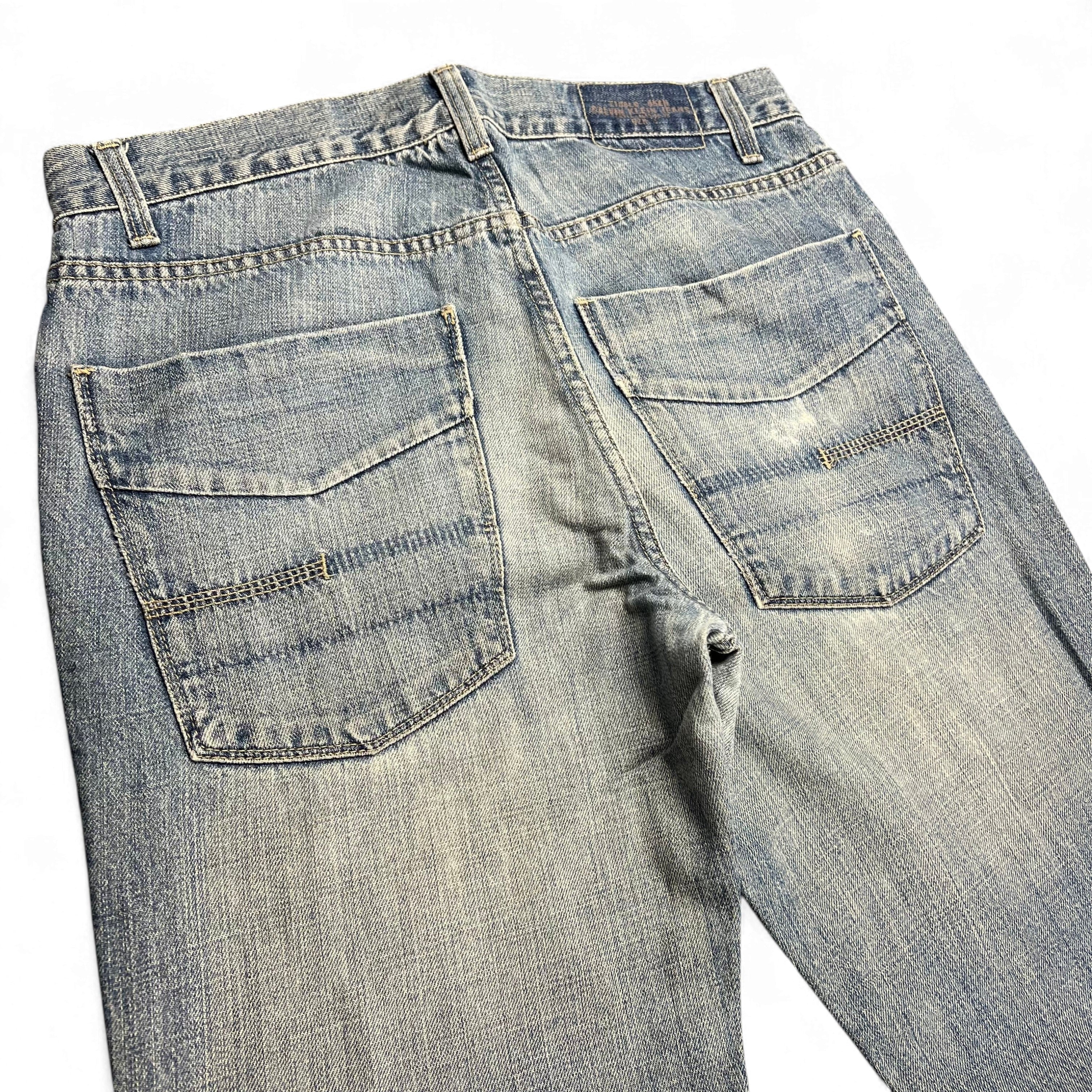 TWC Vintage Calvin Klein Bootcut Jeans aus blauem Denim im 2000er-Jahre-Stil mit großen Gesäßtaschen