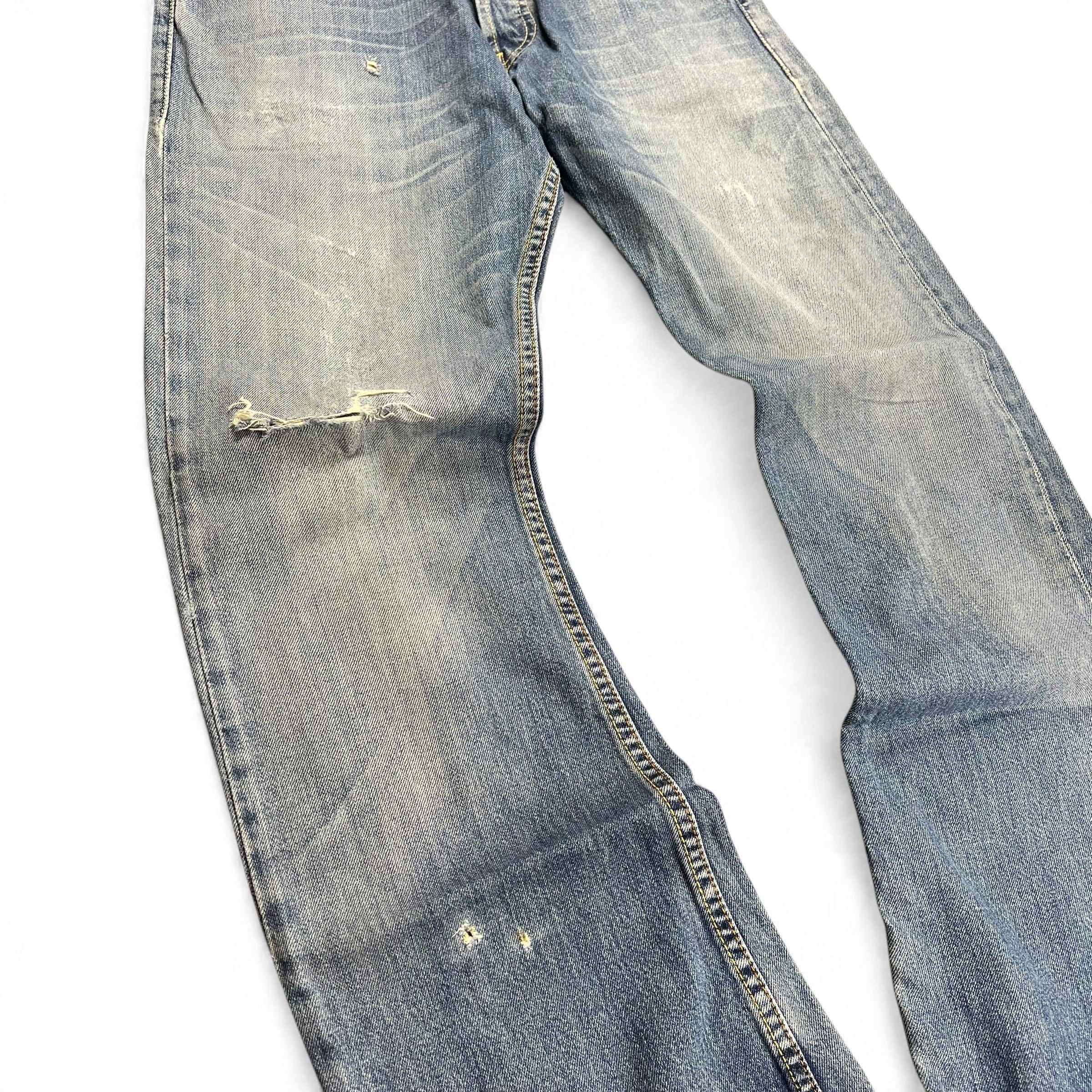 TWC Vintage Levi’s 512 Bootcut Jeans in dirty wash denim with distressed details and frayed knees