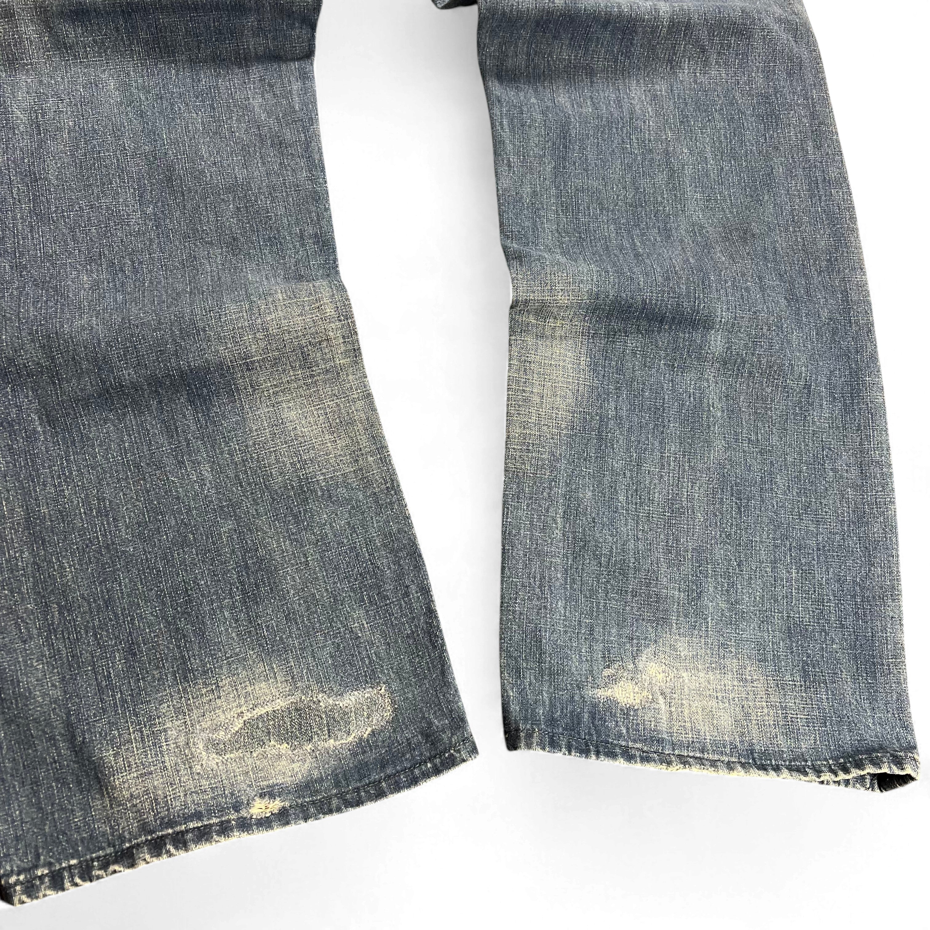 TWC Vintage Evisu Baggy Jeans in verwaschenem Blau mit Distressed-Details an den Beinabschlüssen