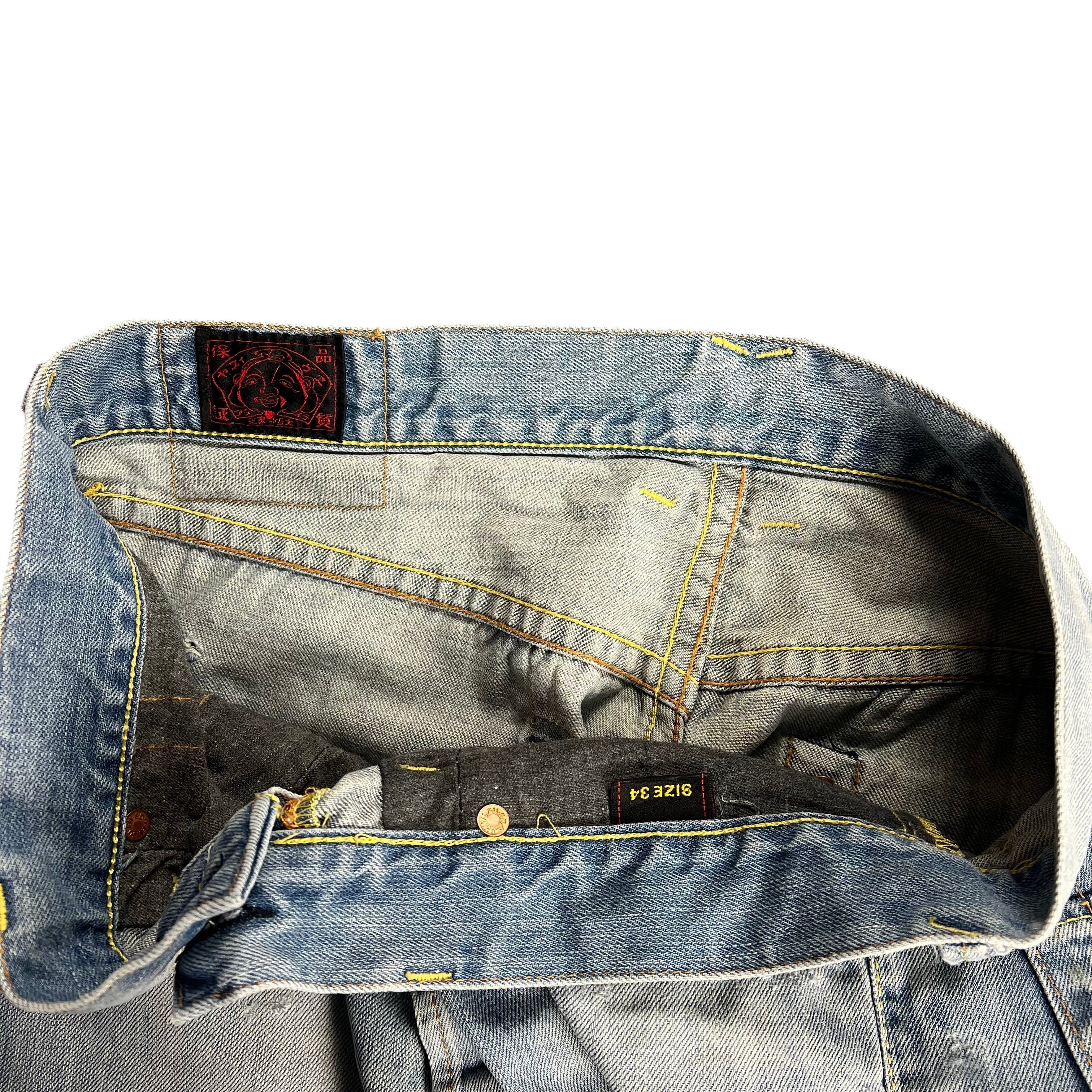 TWC Vintage Evisu Jeans mit hellblauer Waschung, geradem Schnitt und charakteristischem Innenlabel am Bund