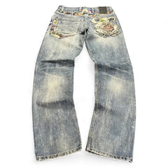 TWC Vintage Jeans mit japanischer Jizo-Stickerei und floralem Muster an den Gesäßtaschen in verwaschenem Blau