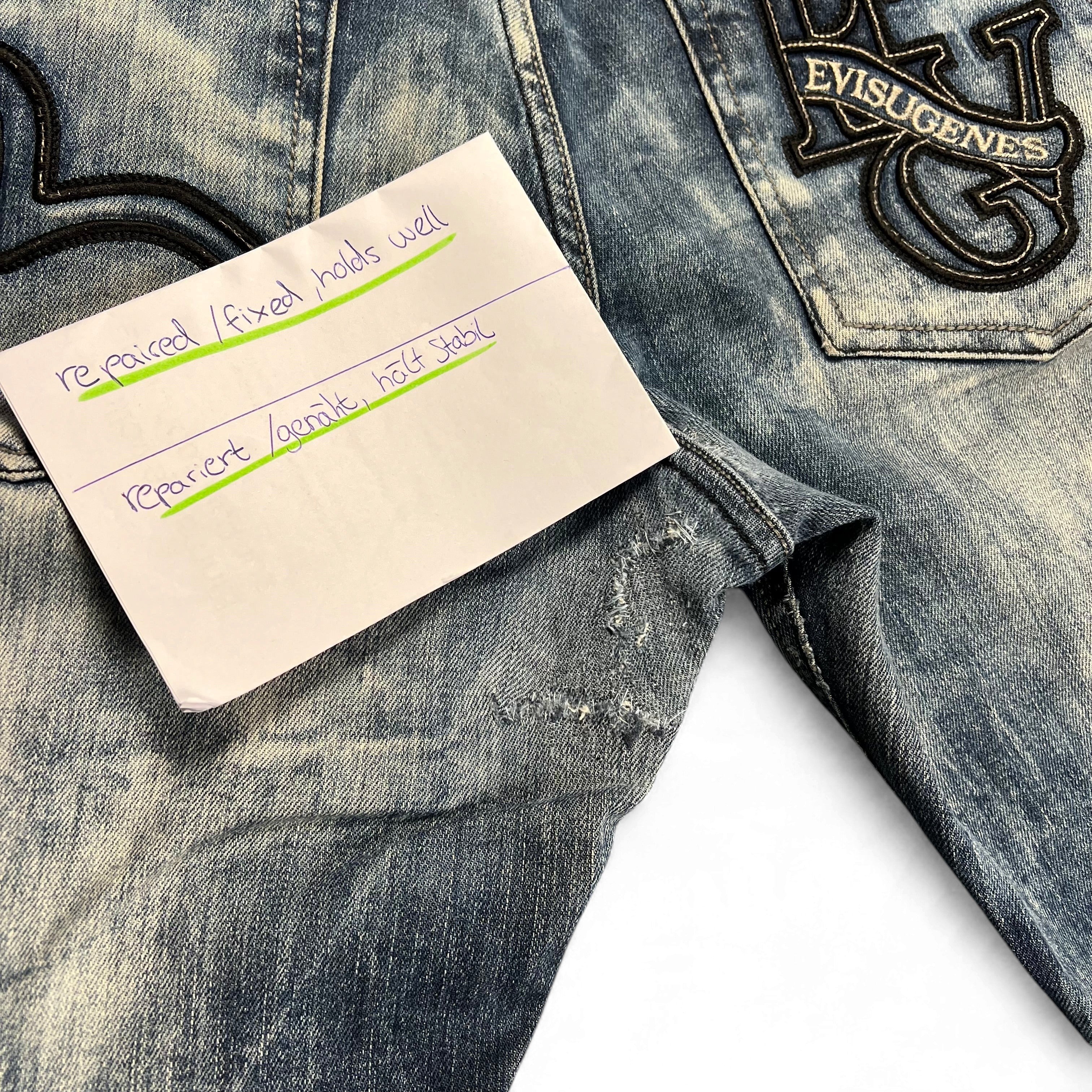 TWC Vintage Evisu KC Straight Jeans in verwaschenem Blau mit reparierter Stelle an der Gesäßtasche und Logo-Stickerei