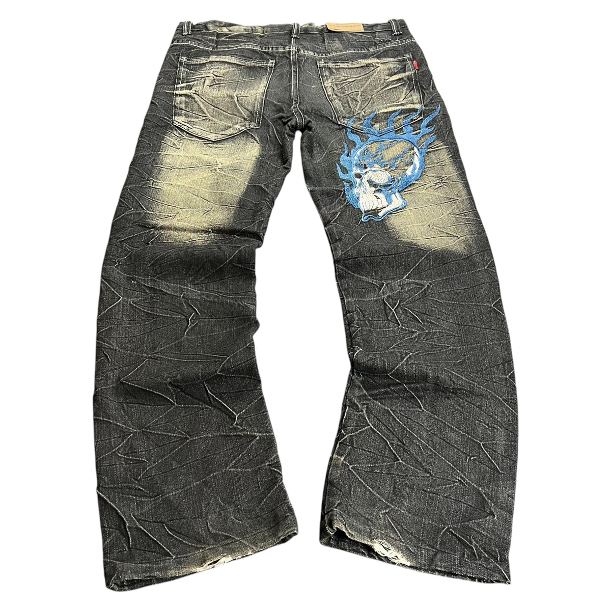 TWC Vintage Jeans aus schwarzem Denim mit japanischer Totenkopf-Stickerei und verwaschenem Crinkle-Effekt